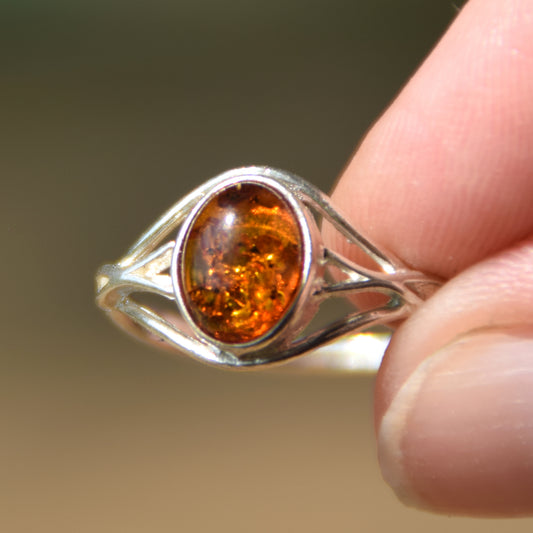 Delicate minimalist-style ring made with natural cognac-colored Amber and 925 Silver, MJ Baltica, BP096