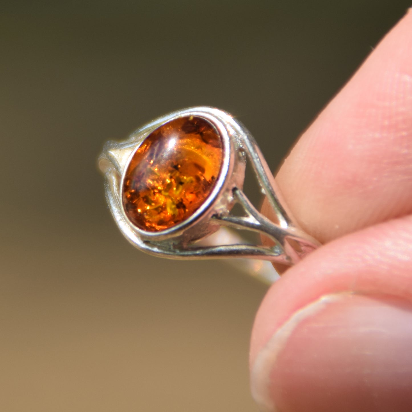 Delicate minimalist-style ring made with natural cognac-colored Amber and 925 Silver, MJ Baltica, BP096