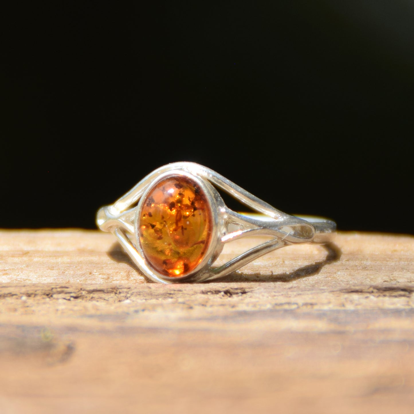 Delicate minimalist-style ring made with natural cognac-colored Amber and 925 Silver, MJ Baltica, BP096