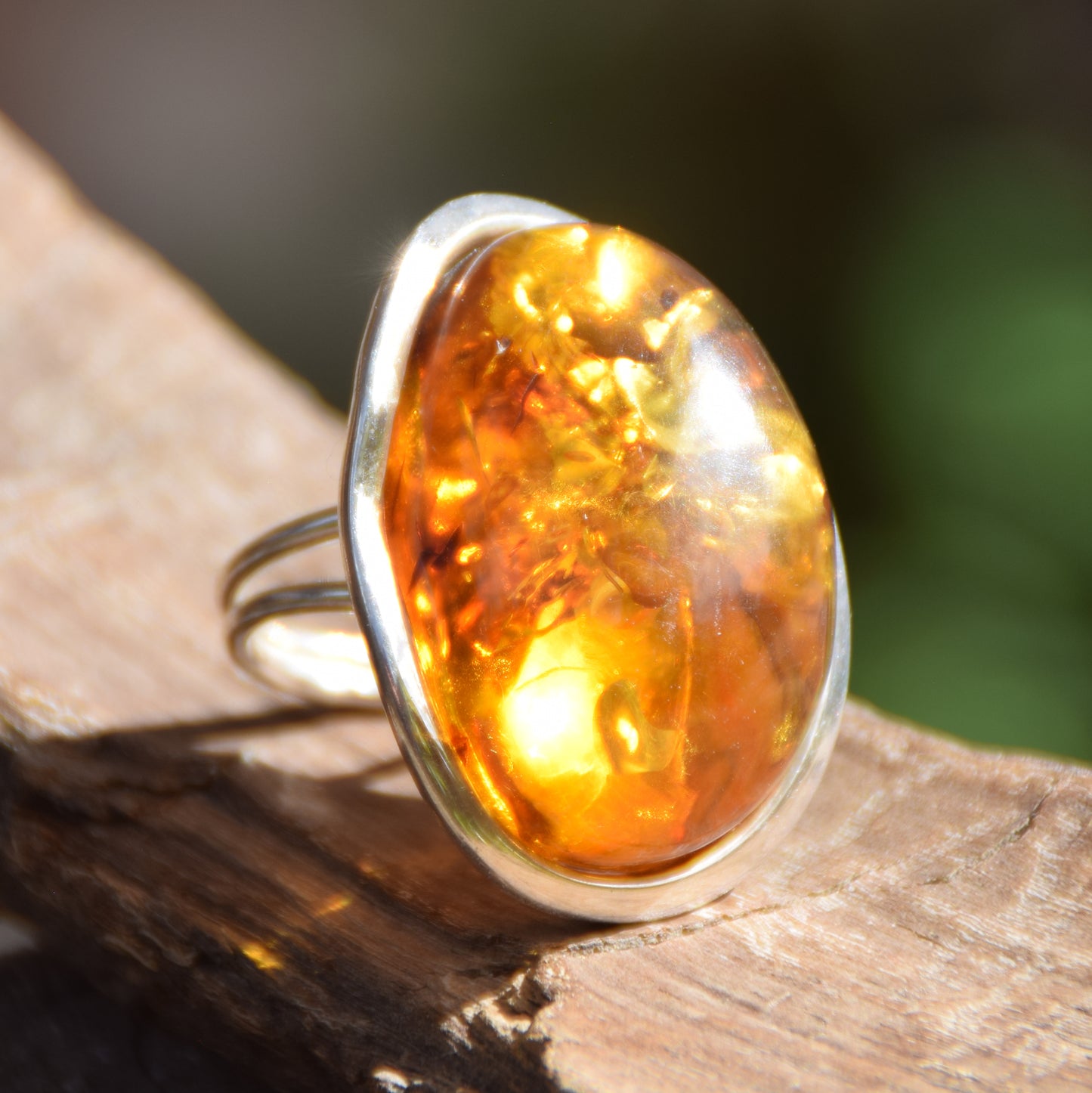 Large adjustable ring with cognac-colored oval natural amber gemstone and 925 Sterling Silver, MJ Baltica, BP108