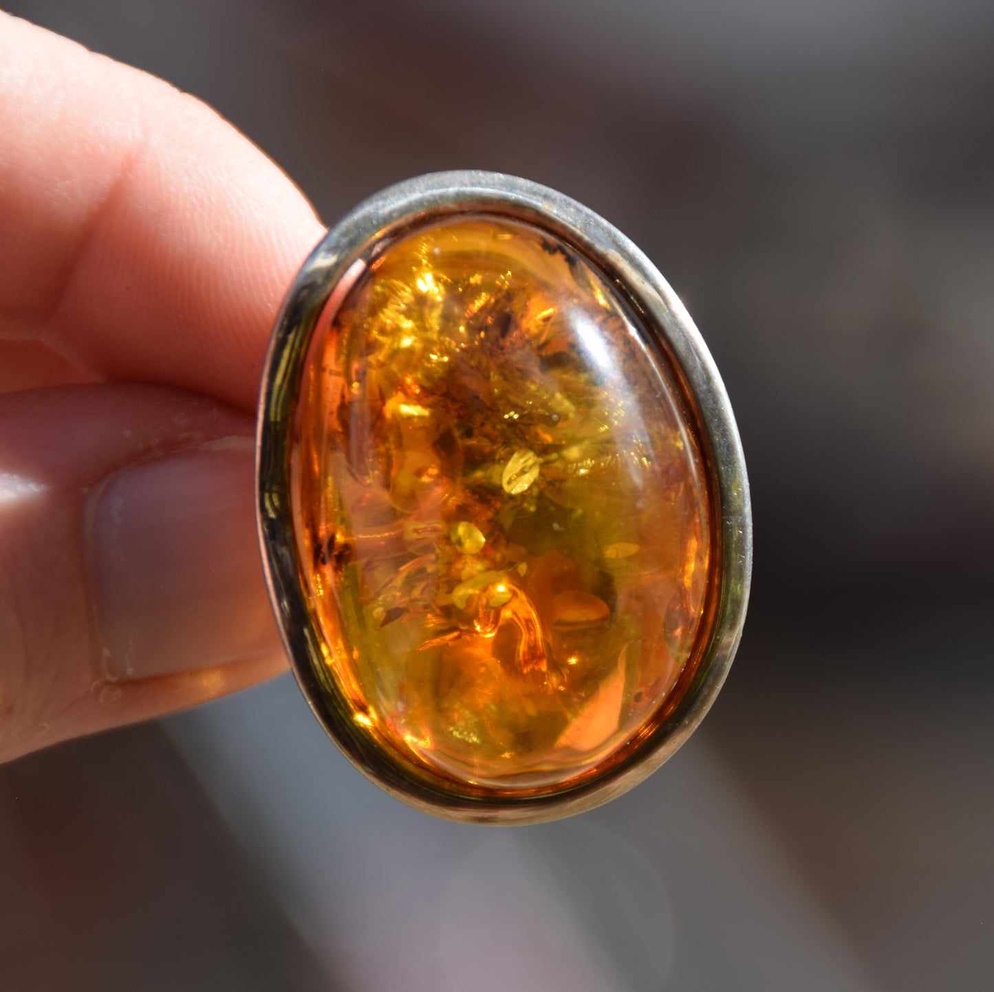 Large adjustable ring with cognac-colored oval natural amber gemstone and 925 Sterling Silver, MJ Baltica, BP108