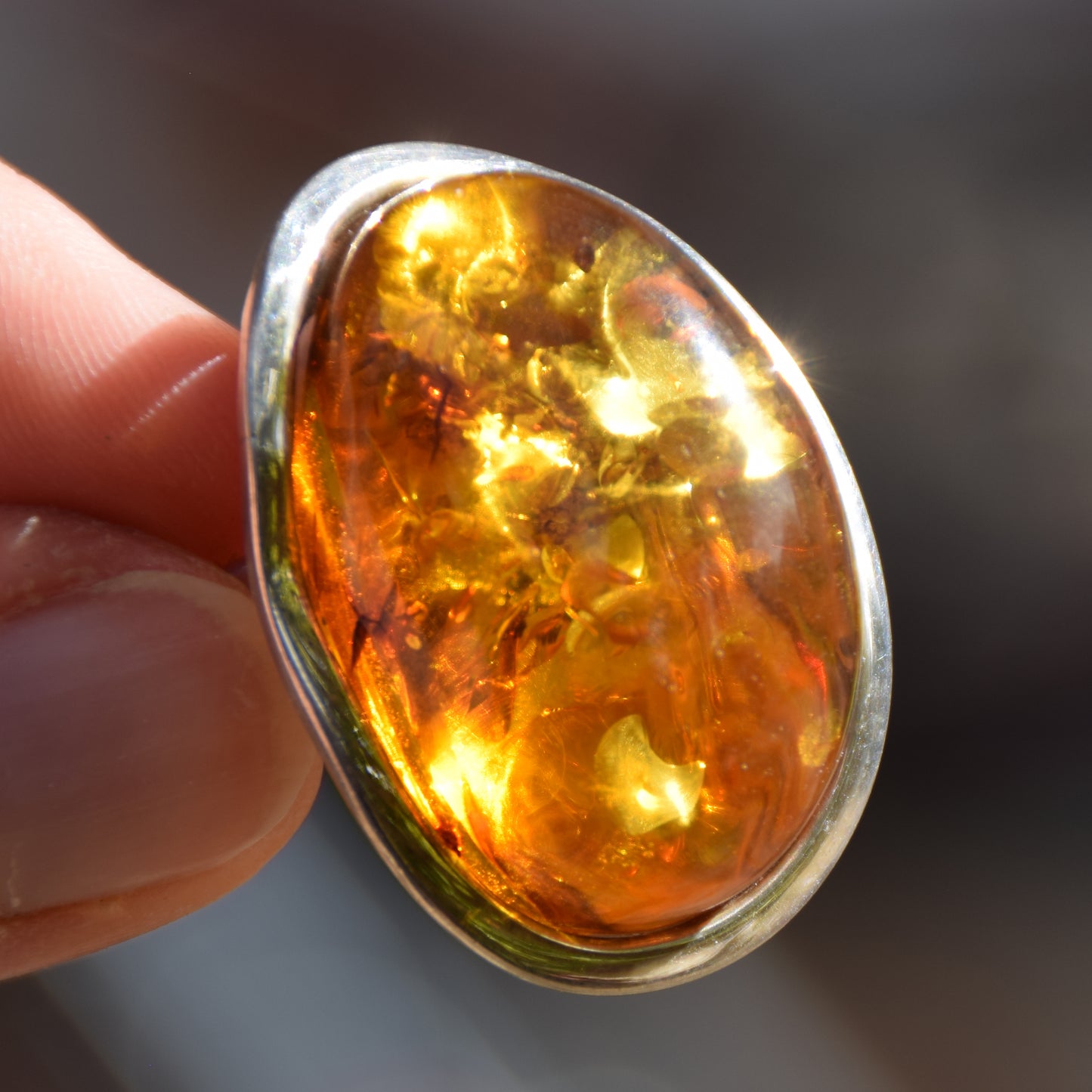 Large adjustable ring with cognac-colored oval natural amber gemstone and 925 Sterling Silver, MJ Baltica, BP108