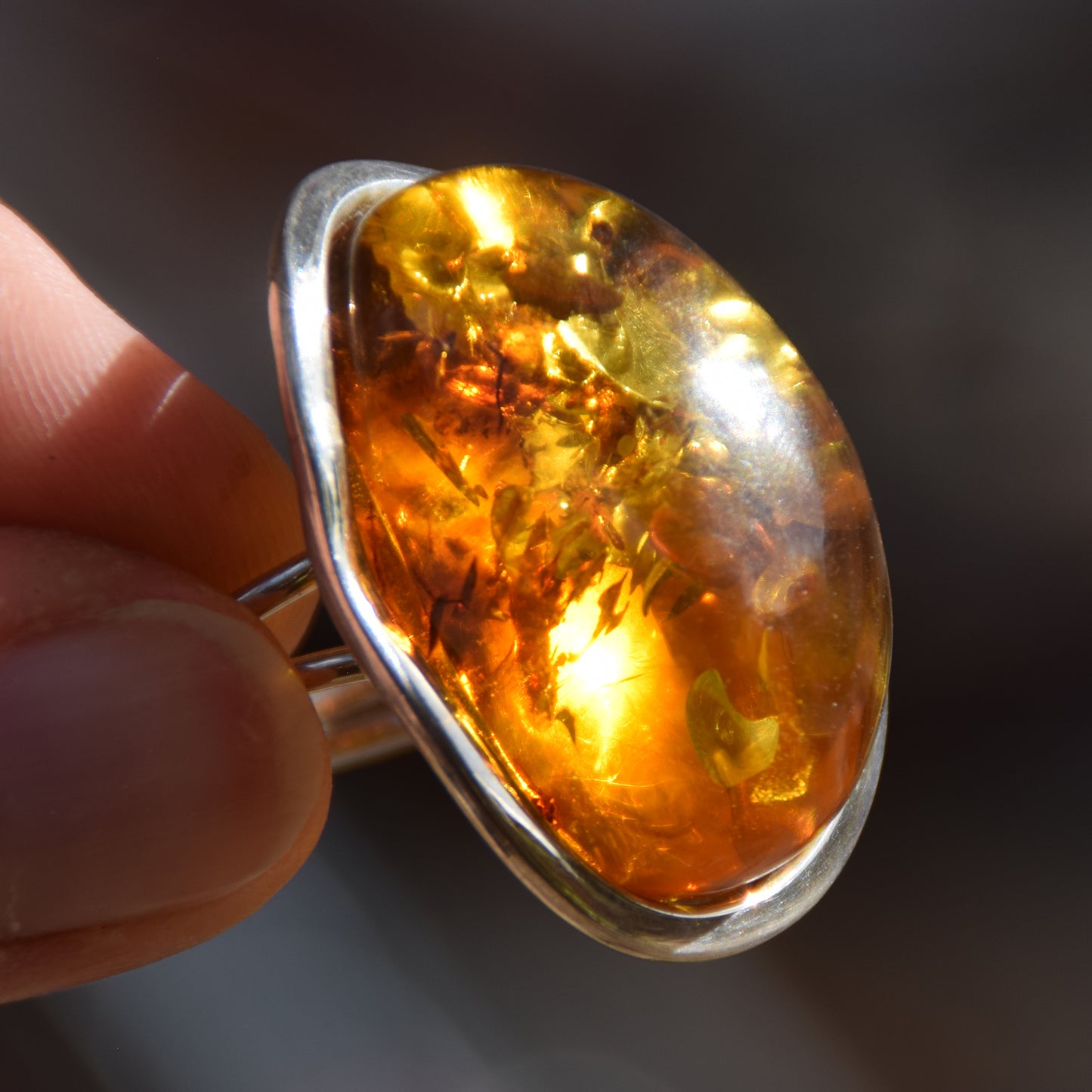 Large adjustable ring with cognac-colored oval natural amber gemstone and 925 Sterling Silver, MJ Baltica, BP108
