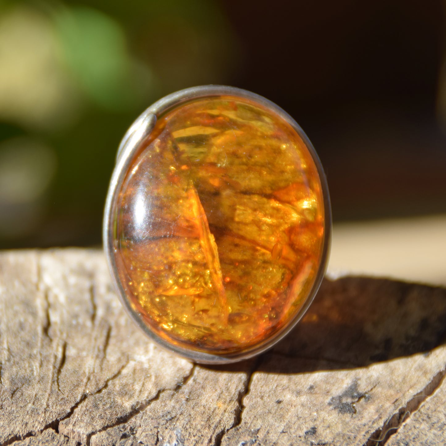 Large ring crafted with Cognac-colored Natural Amber with various inclusions and 925 Silver, MJ Baltica, BP115