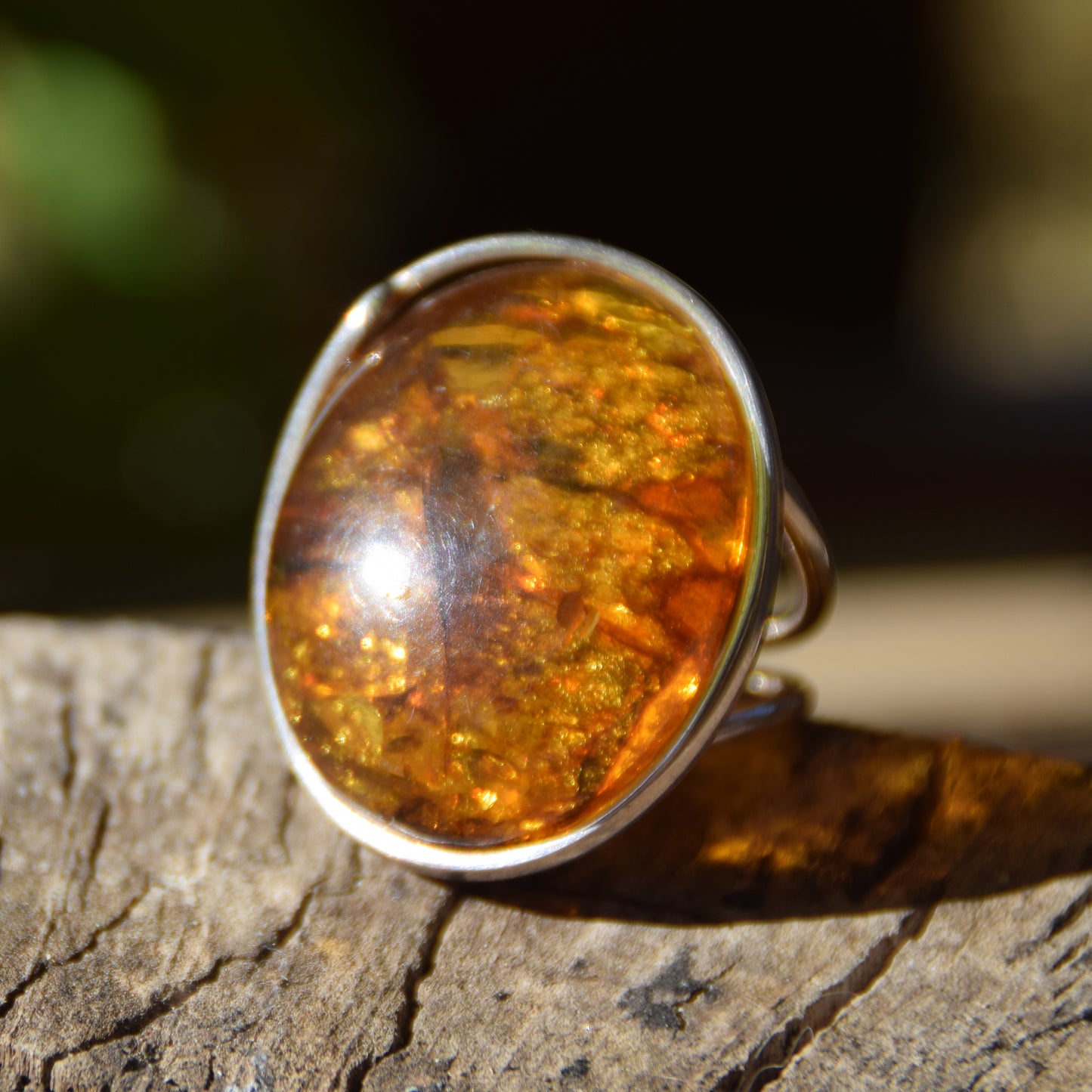 Large ring crafted with Cognac-colored Natural Amber with various inclusions and 925 Silver, MJ Baltica, BP115