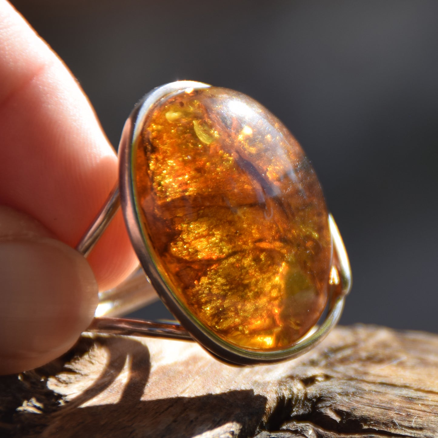 Large ring crafted with Cognac-colored Natural Amber with various inclusions and 925 Silver, MJ Baltica, BP115