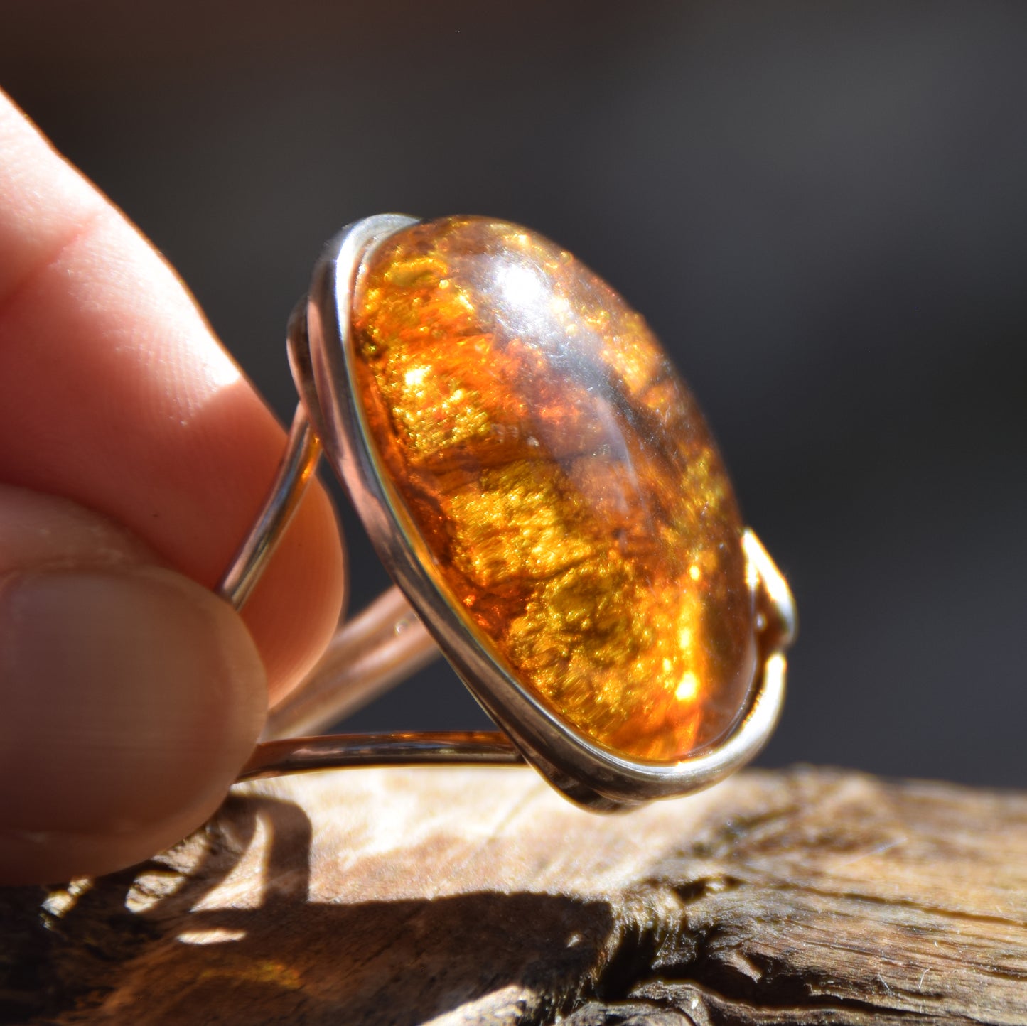 Large ring crafted with Cognac-colored Natural Amber with various inclusions and 925 Silver, MJ Baltica, BP115