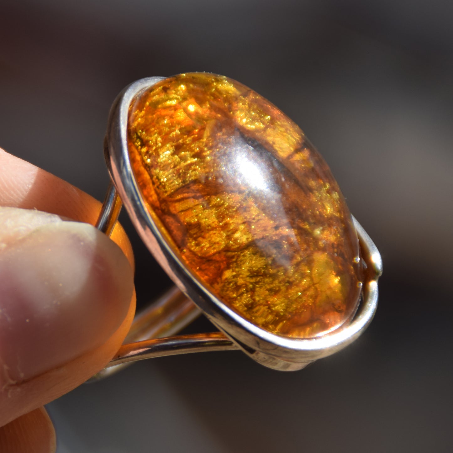 Large ring crafted with Cognac-colored Natural Amber with various inclusions and 925 Silver, MJ Baltica, BP115