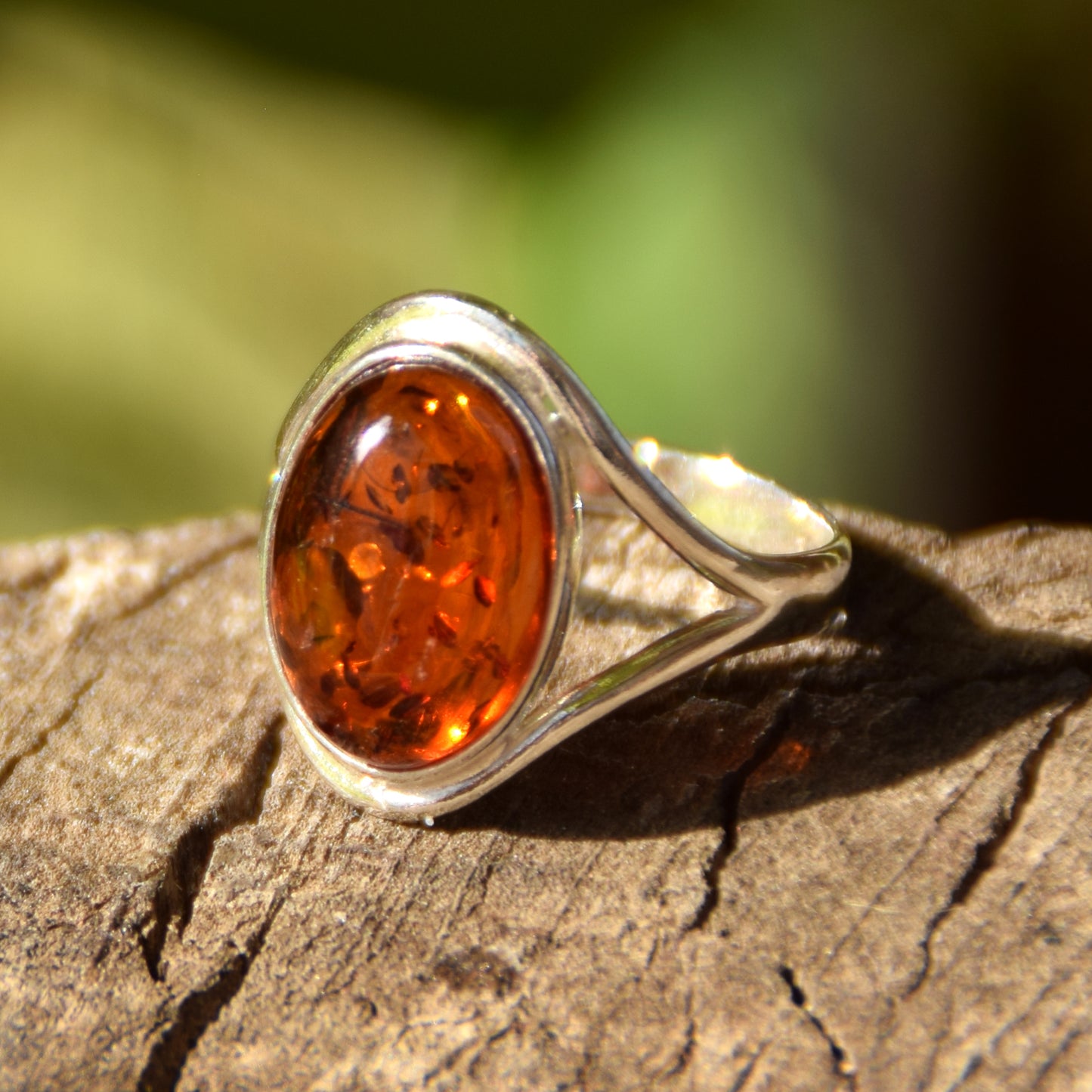 Elegant and luminous ring made with natural cognac-colored Amber and 925 Sterling Silver, MJ Baltica, BP150