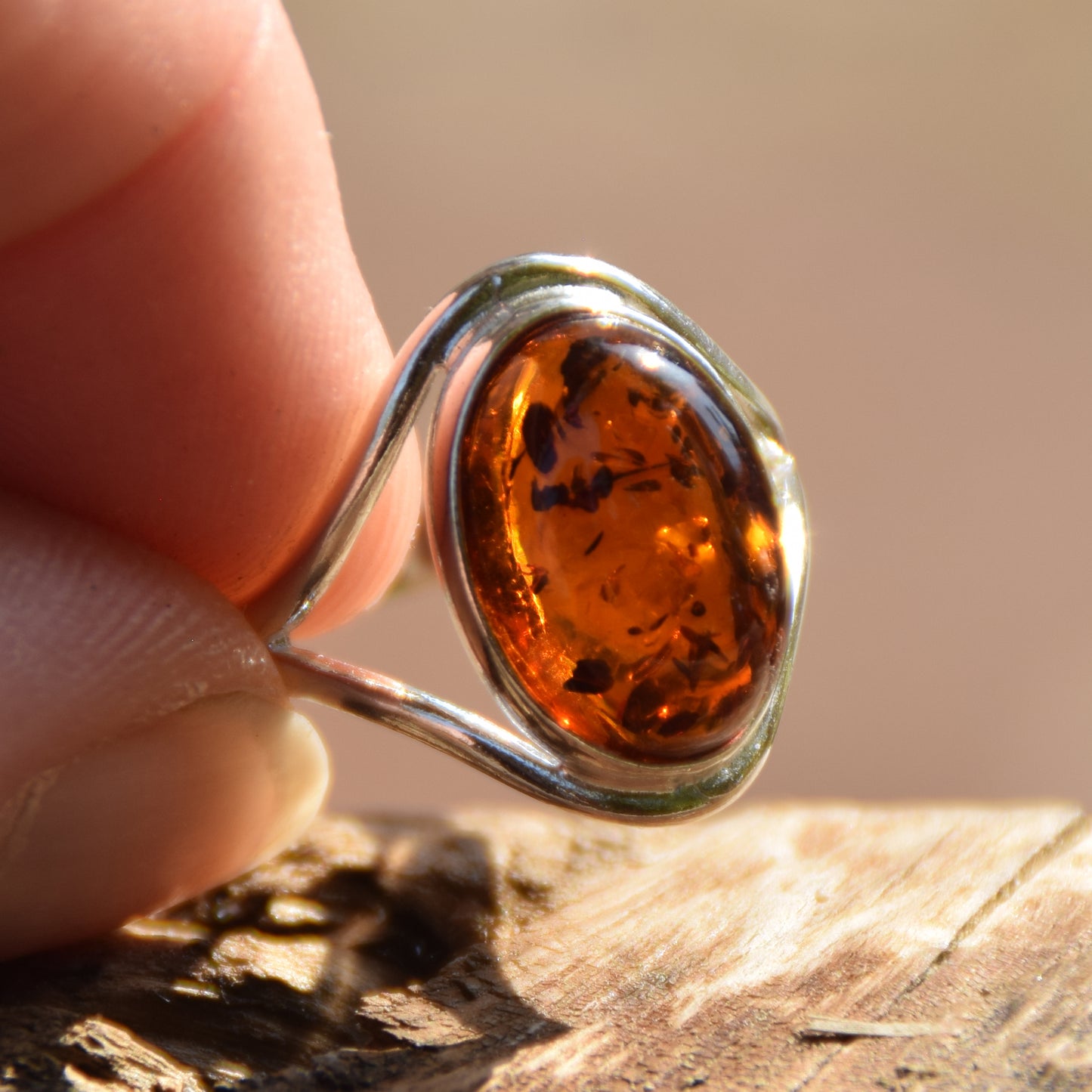 Elegant and luminous ring made with natural cognac-colored Amber and 925 Sterling Silver, MJ Baltica, BP150