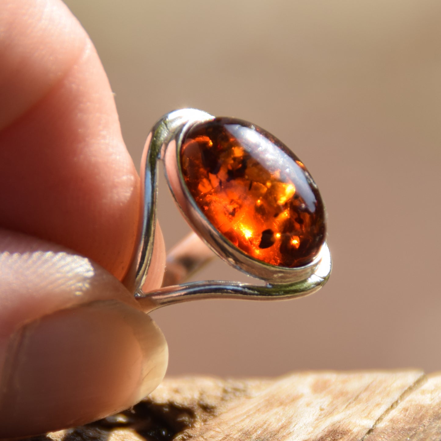 Elegant and luminous ring made with natural cognac-colored Amber and 925 Sterling Silver, MJ Baltica, BP150