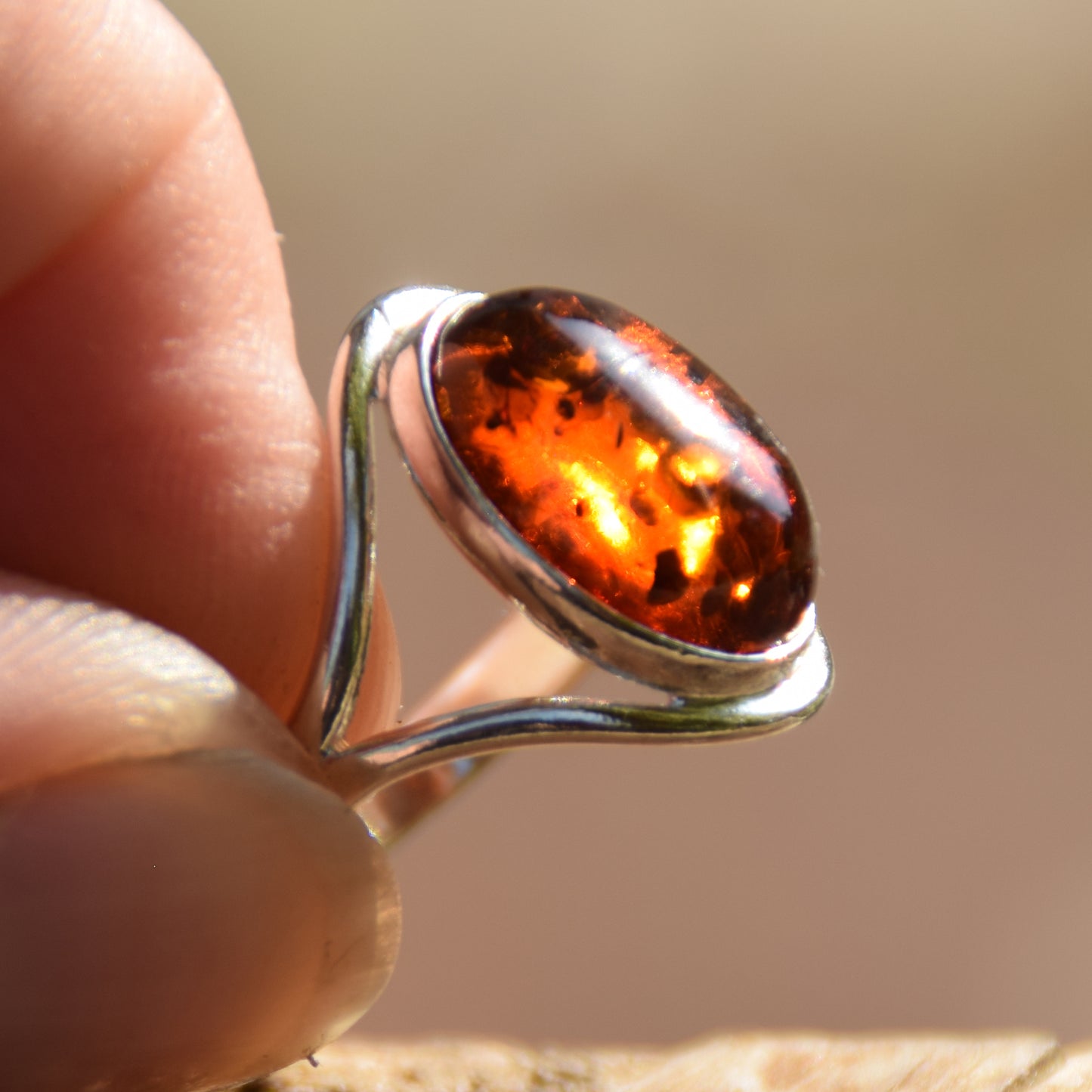 Elegant and luminous ring made with natural cognac-colored Amber and 925 Sterling Silver, MJ Baltica, BP150