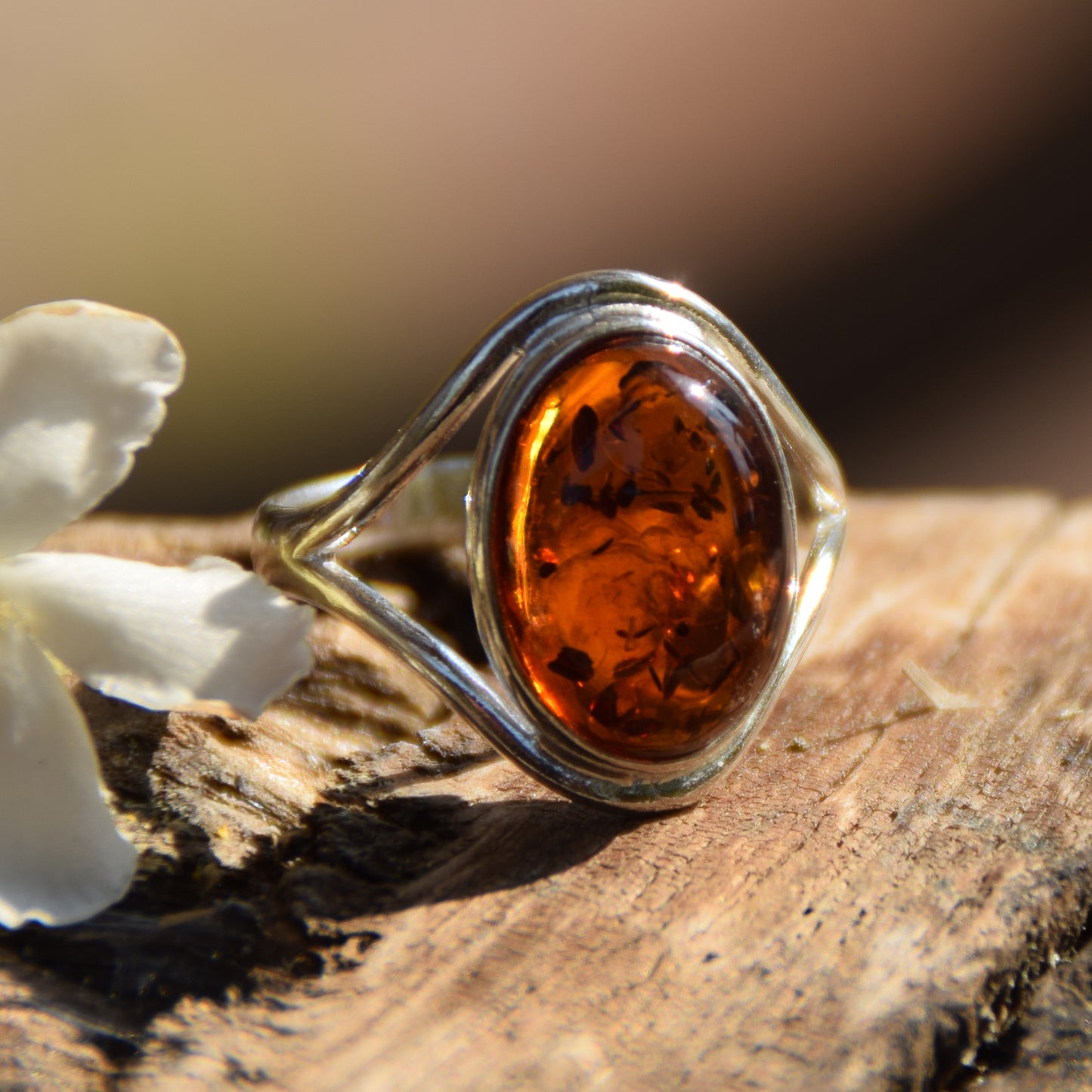 Elegant and luminous ring made with natural cognac-colored Amber and 925 Sterling Silver, MJ Baltica, BP150