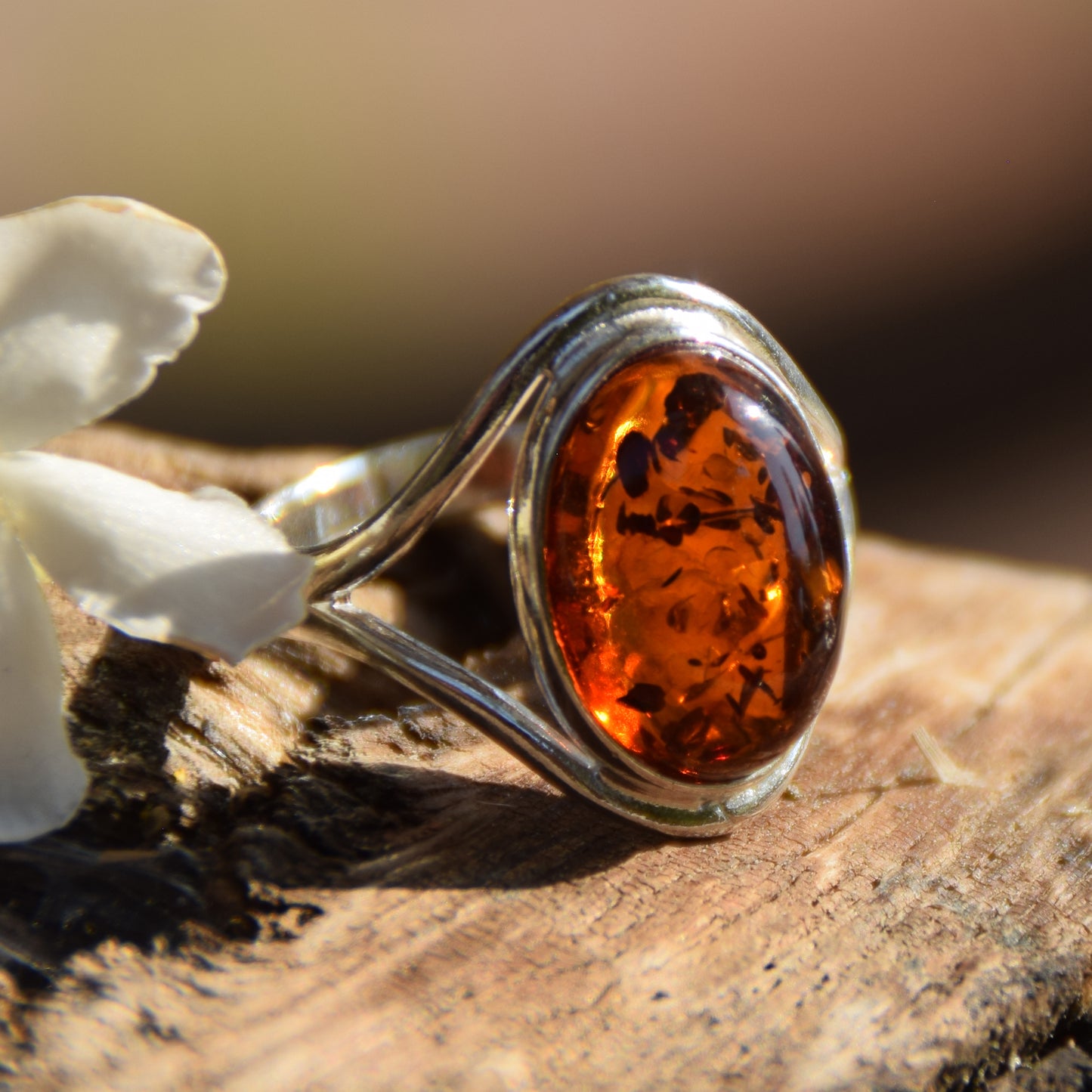 Elegant and luminous ring made with natural cognac-colored Amber and 925 Sterling Silver, MJ Baltica, BP150