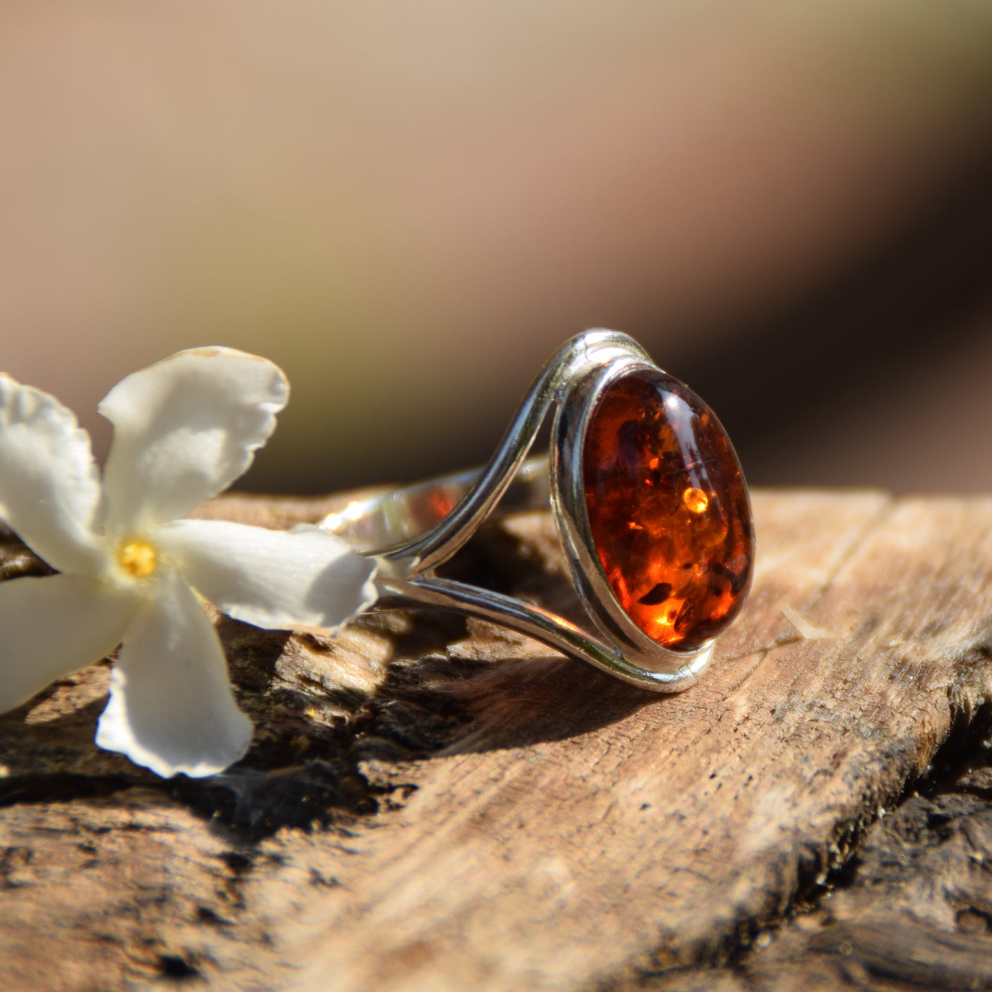 Elegant and luminous ring made with natural cognac-colored Amber and 925 Sterling Silver, MJ Baltica, BP150