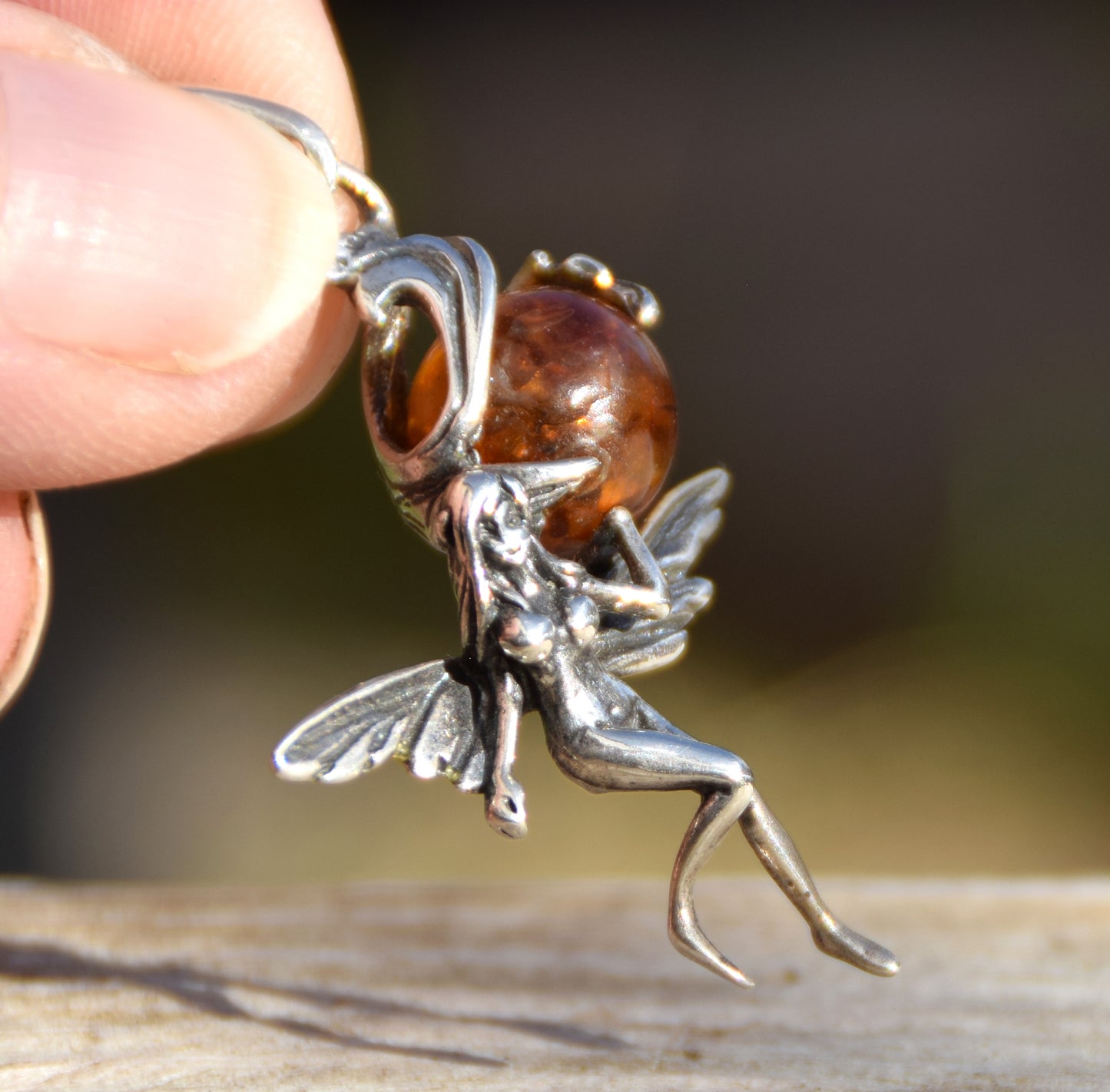 Realistic fairy pendant with natural cognac amber ball in Sterling Silver 925, MJ Baltica, BW010