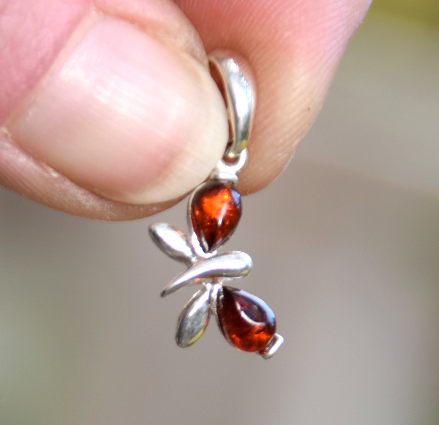 Delicate butterfly pendant in cognac natural amber and 925 silver, MJ Baltica, BW038