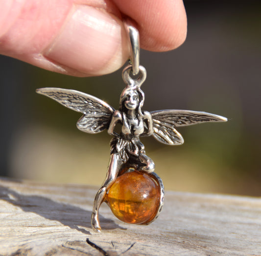 Fairy-shaped pendant in cognac-colored natural amber and 925 silver, MJ Baltica, BW056
