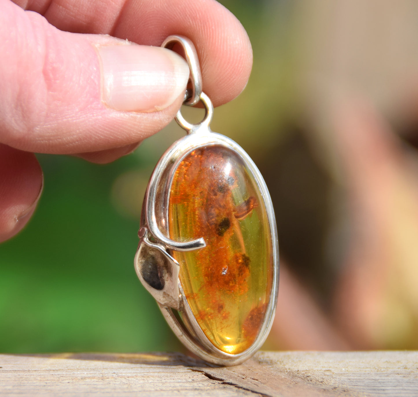 Large luminous pendant with natural Amber rich in million-year-old inclusions and Sterling Silver 925, MJ Baltica, BW088