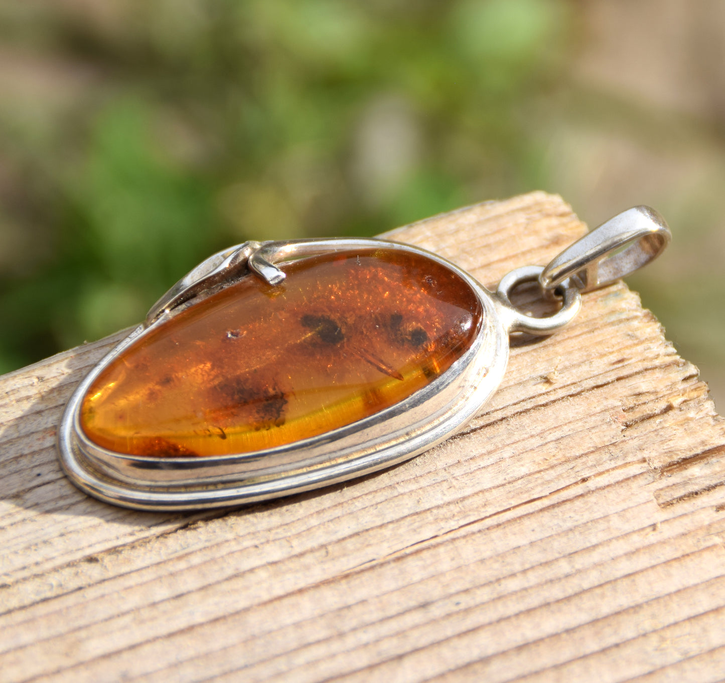 Large luminous pendant with natural Amber rich in million-year-old inclusions and Sterling Silver 925, MJ Baltica, BW088