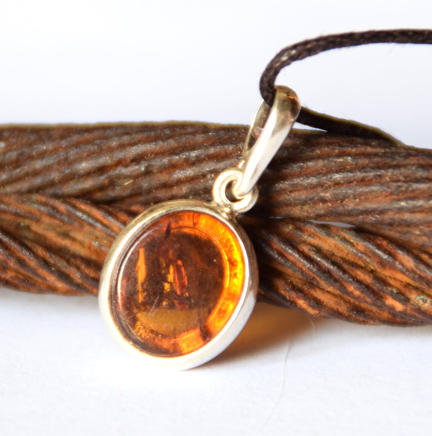Delicate pendant created with natural cognac-colored Amber and 925 Silver, MJ Baltica, BW141