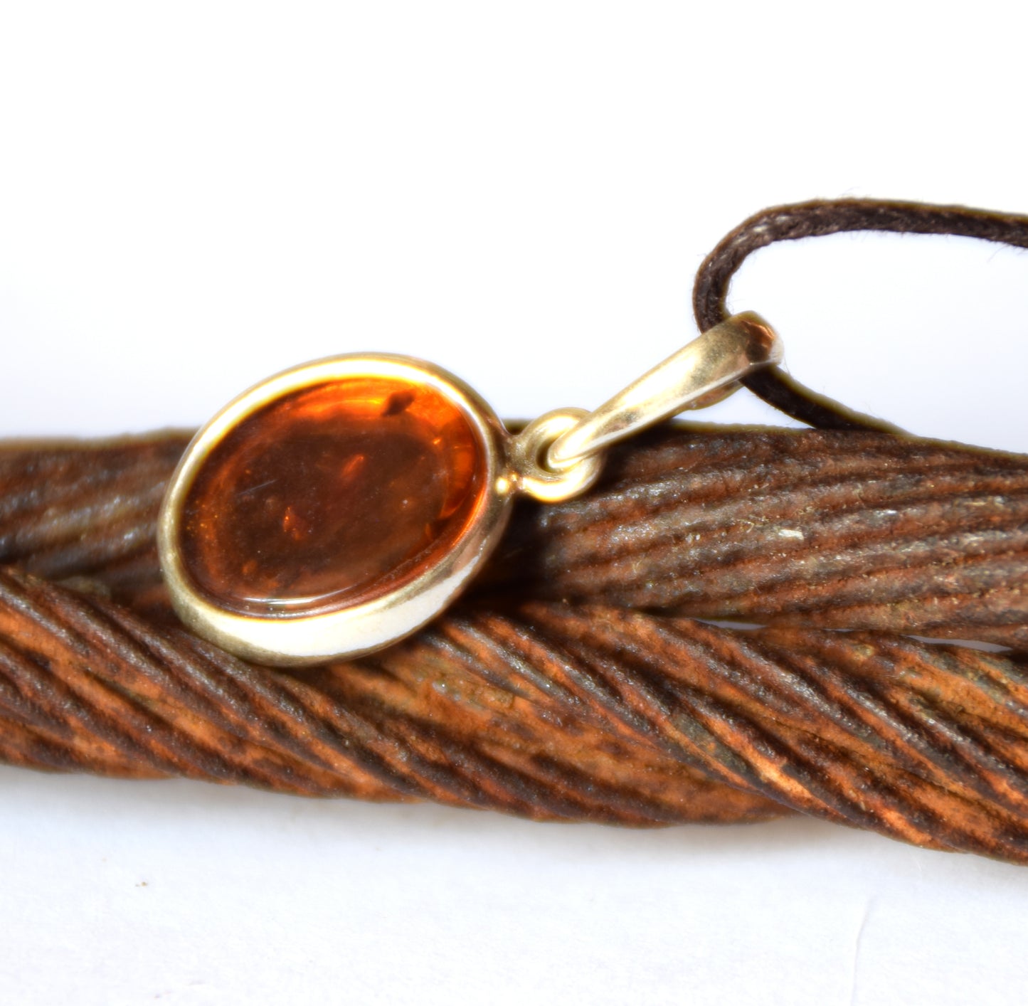Delicate pendant created with natural cognac-colored Amber and 925 Silver, MJ Baltica, BW141
