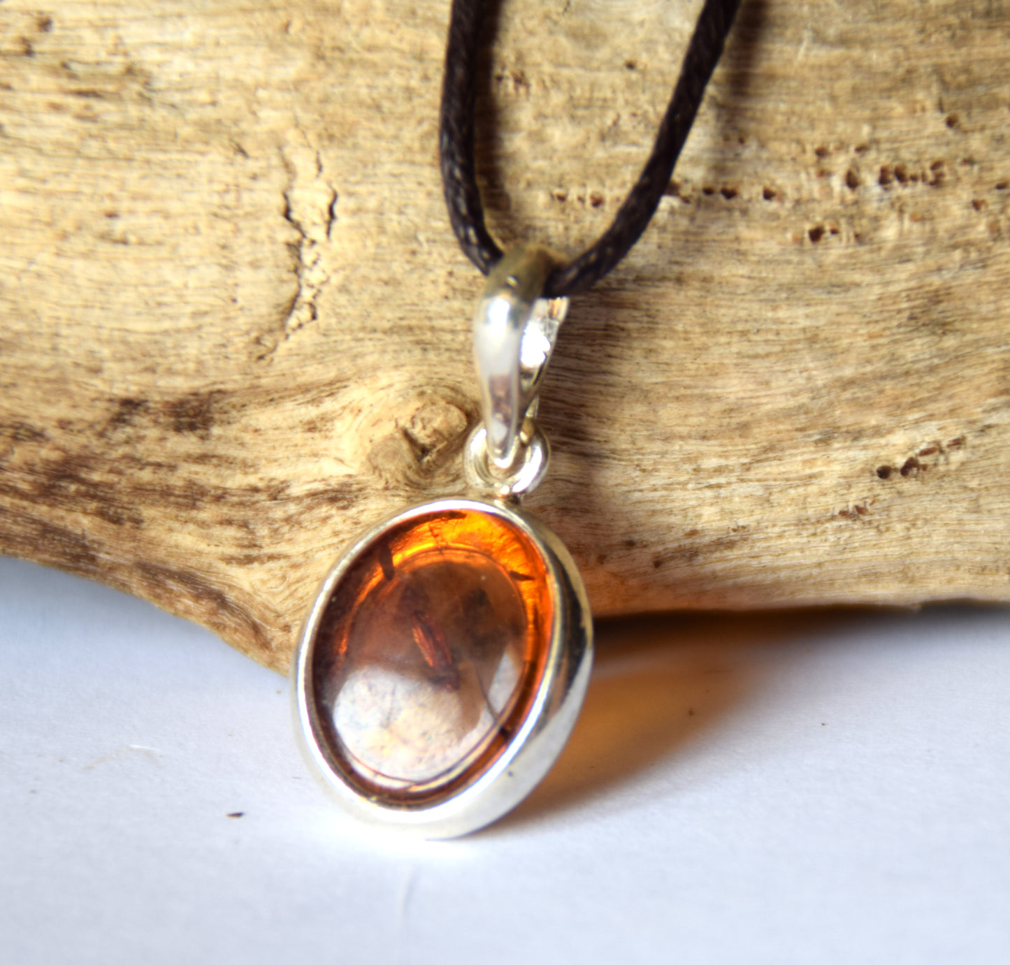Delicate pendant created with natural cognac-colored Amber and 925 Silver, MJ Baltica, BW141