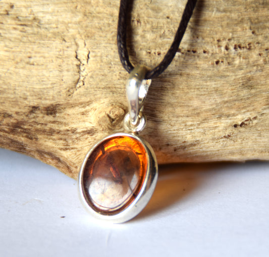Delicate pendant created with natural cognac-colored Amber and 925 Silver, MJ Baltica, BW141