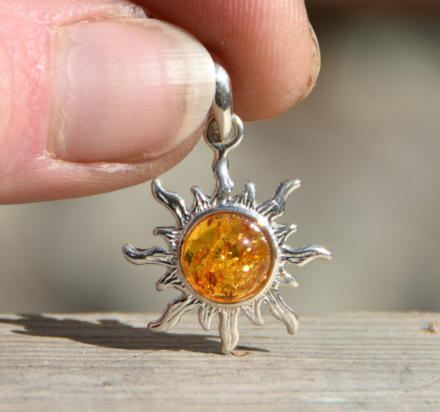Luminous sun pendant in natural cognac amber and 925 silver, MJ Baltica, BW146