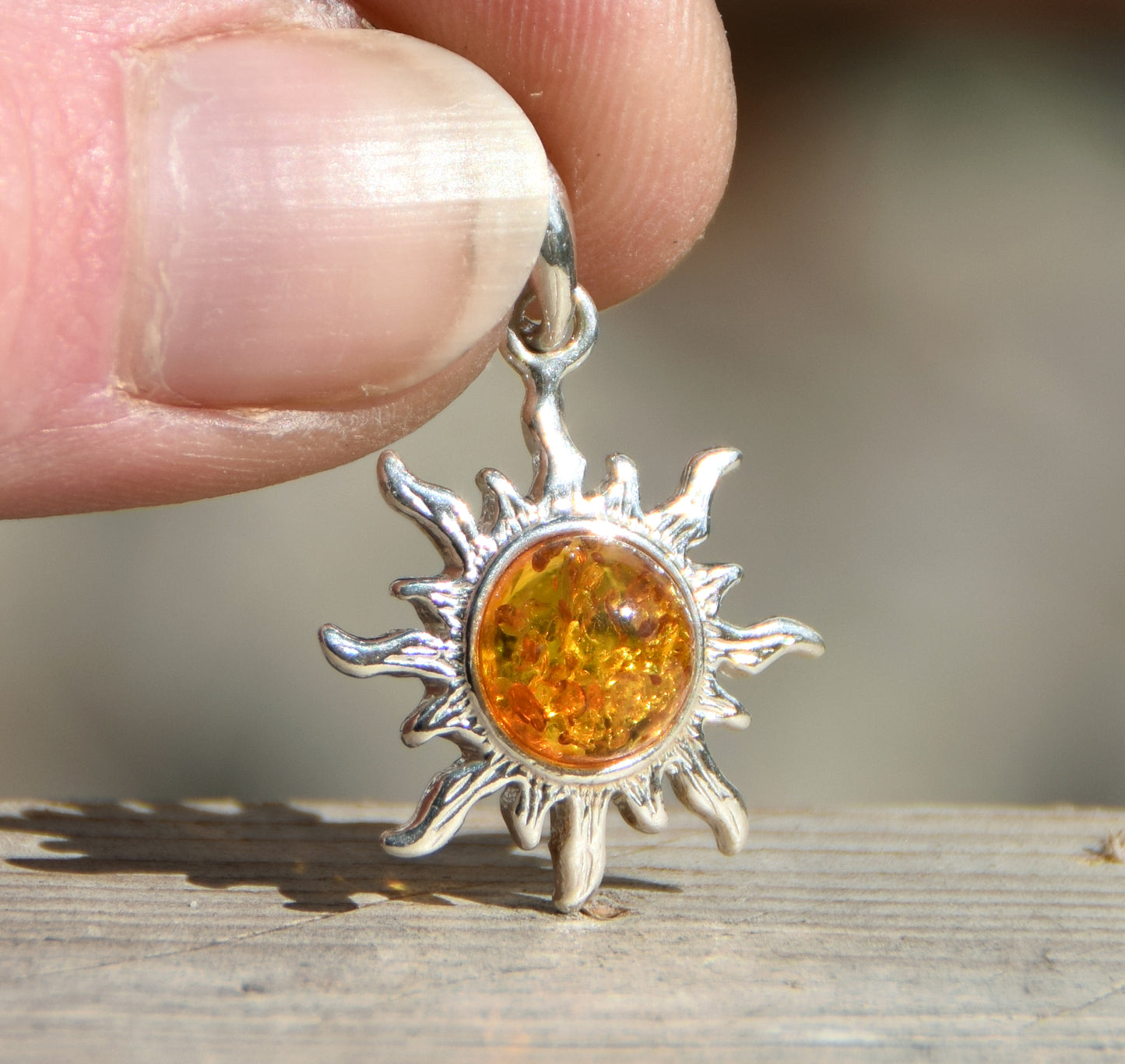 Luminous sun pendant in natural cognac amber and 925 silver, MJ Baltica, BW146