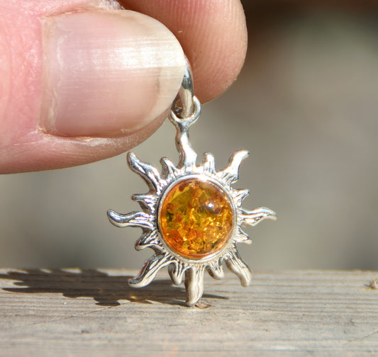 Luminous sun pendant in natural cognac amber and 925 silver, MJ Baltica, BW146