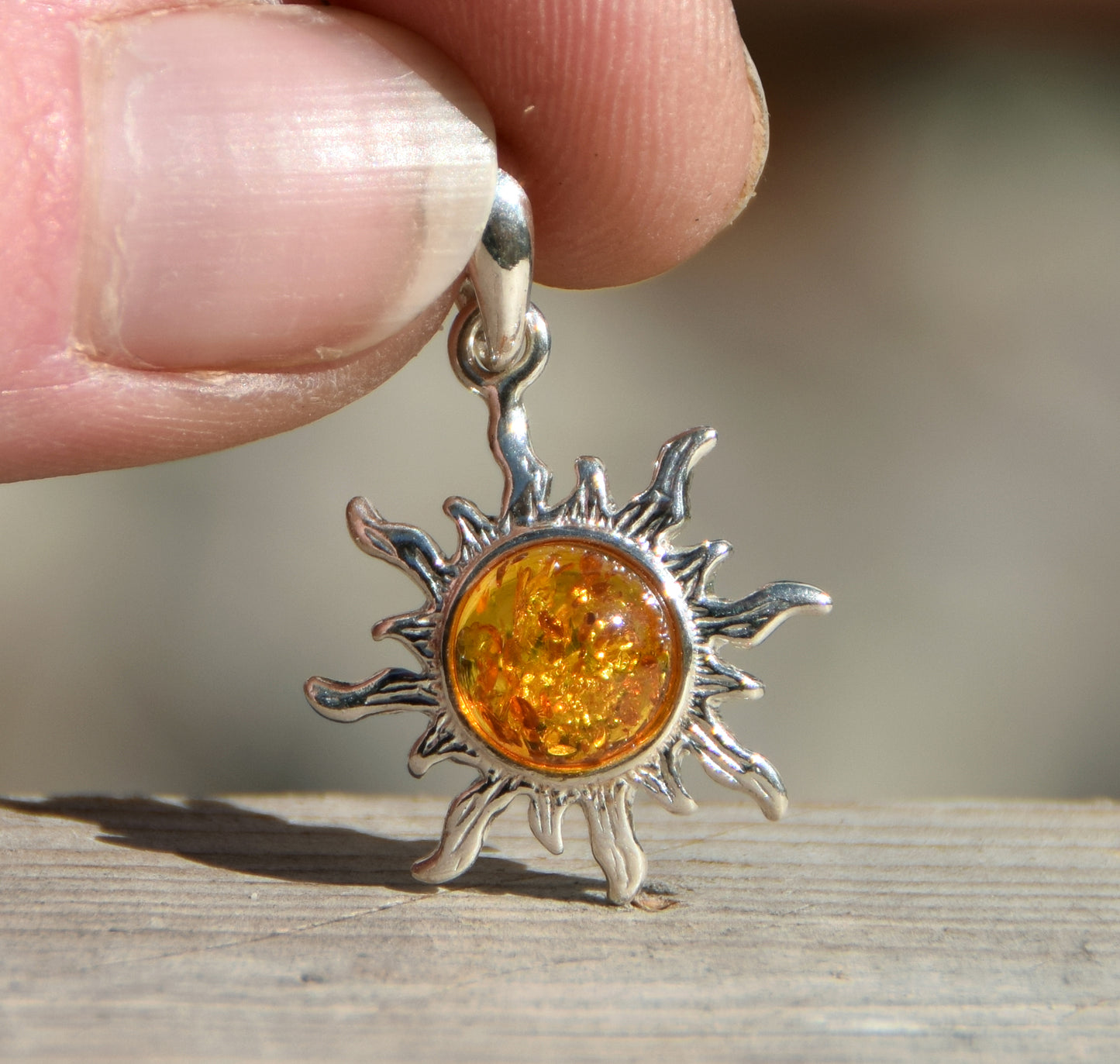 Luminous sun pendant in natural cognac amber and 925 silver, MJ Baltica, BW146