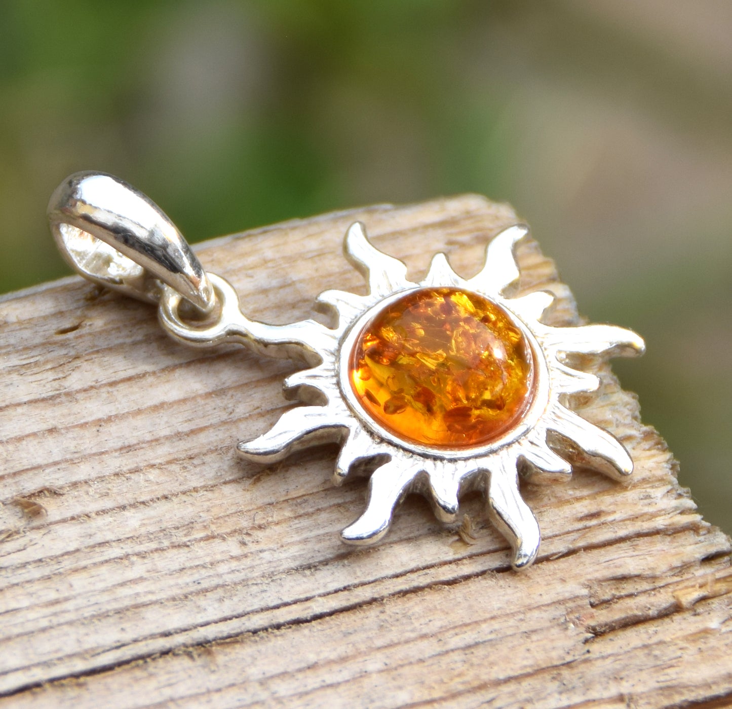 Luminous sun pendant in natural cognac amber and 925 silver, MJ Baltica, BW146