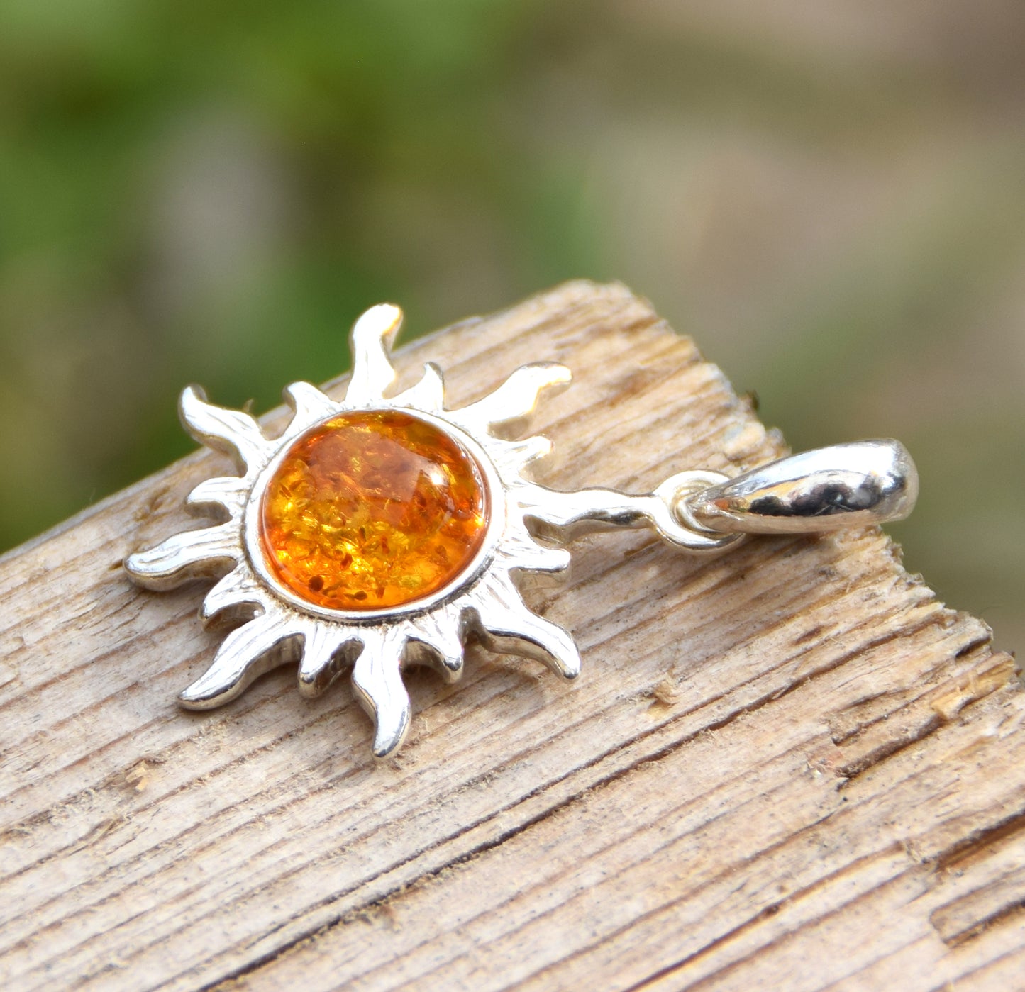 Luminous sun pendant in natural cognac amber and 925 silver, MJ Baltica, BW146