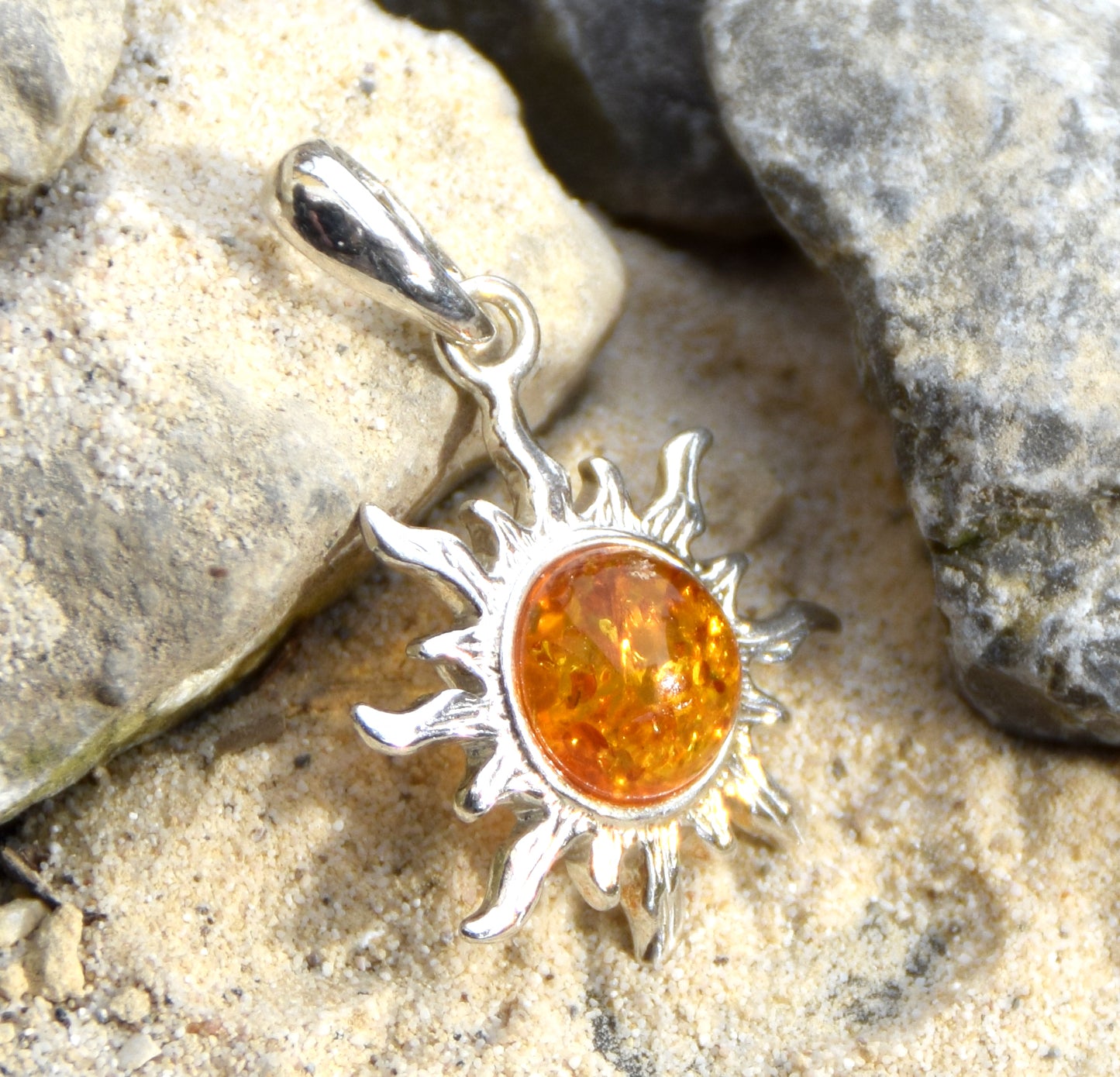 Luminous sun pendant in natural cognac amber and 925 silver, MJ Baltica, BW146