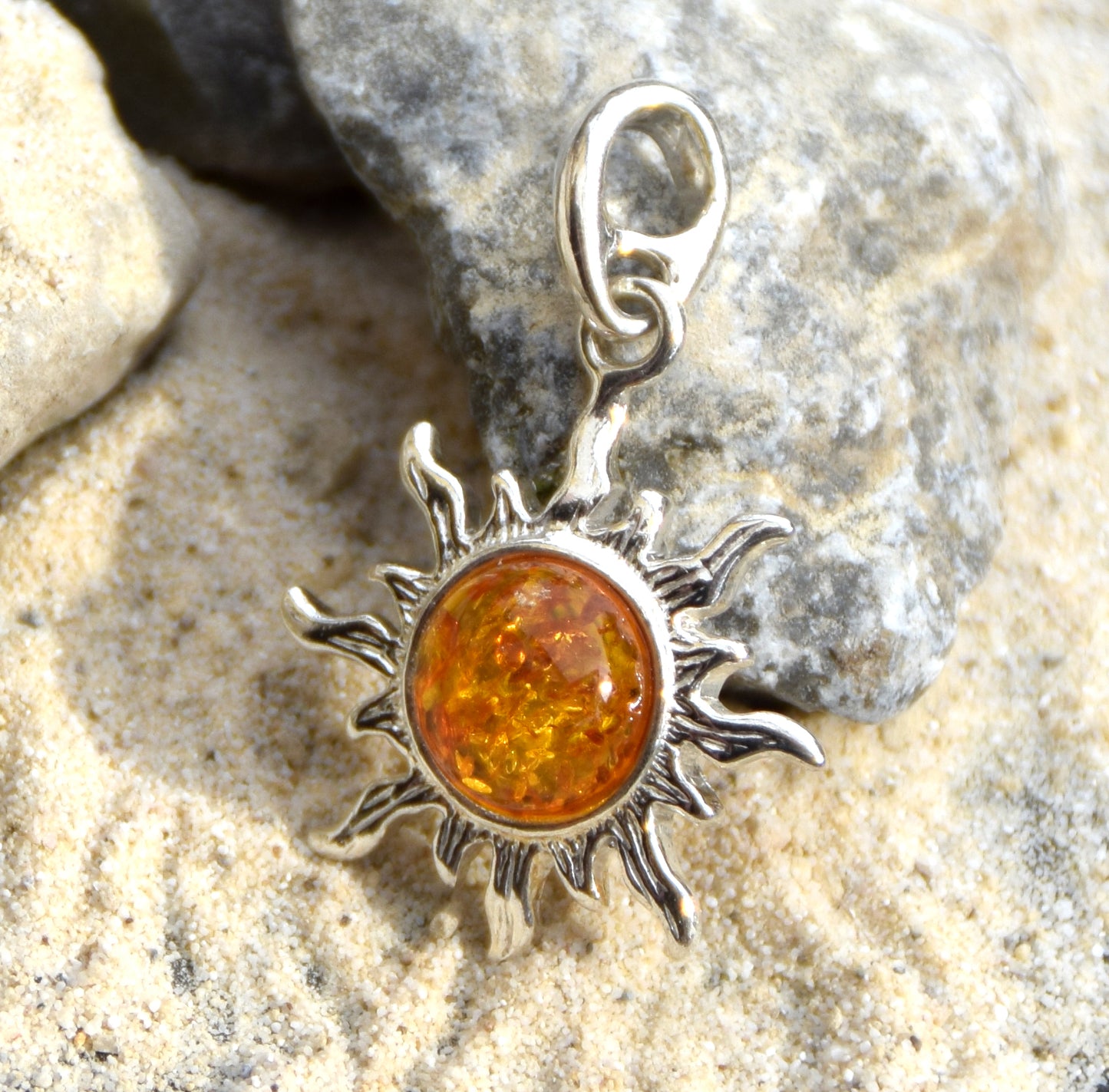 Luminous sun pendant in natural cognac amber and 925 silver, MJ Baltica, BW146
