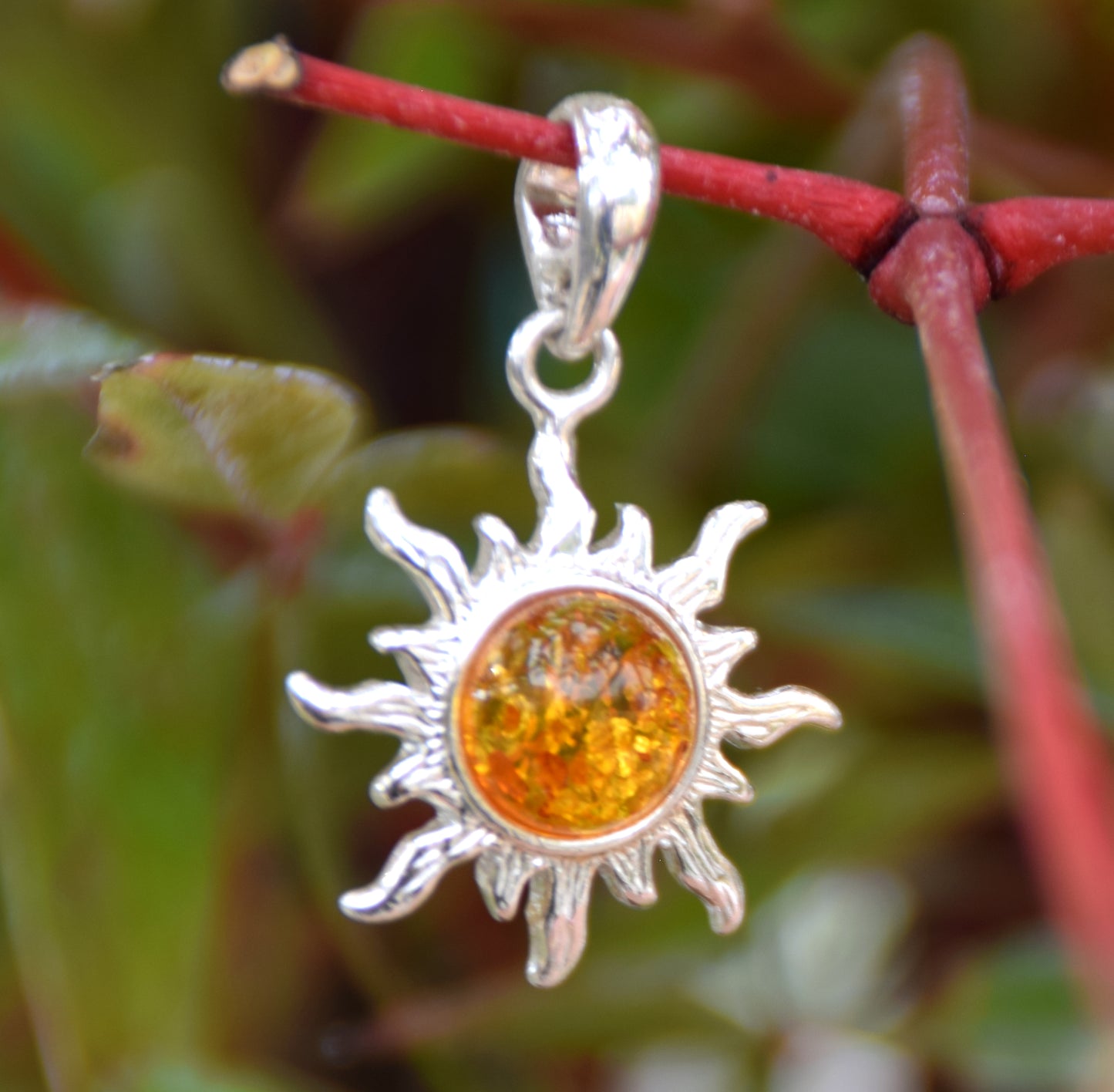 Luminous sun pendant in natural cognac amber and 925 silver, MJ Baltica, BW146