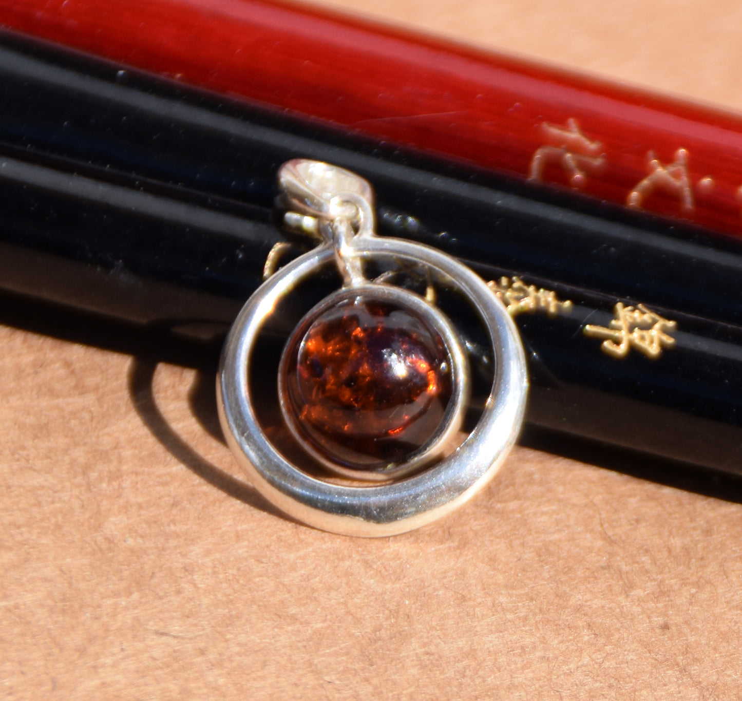 Light circle pendant with round natural brown Amber and 925 Sterling Silver, MJ Baltica, BW162