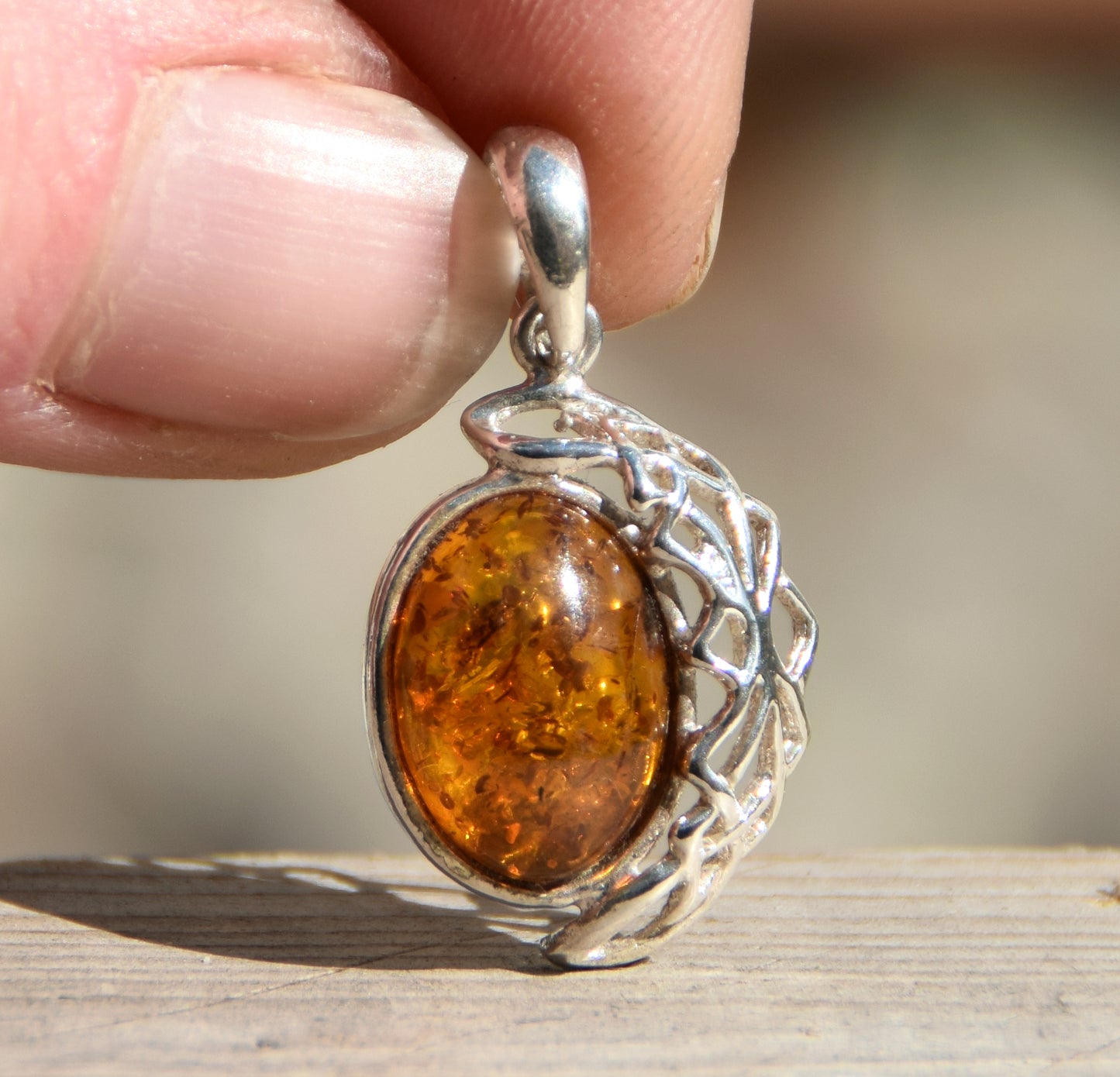 Elegant oval pendant with natural cognac-colored Amber and 925 Silver, MJ Baltica, BW164