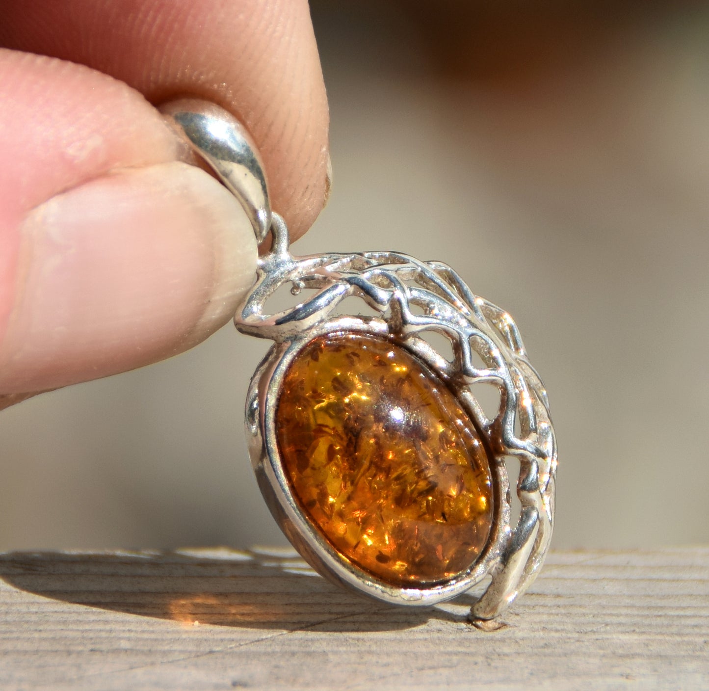 Elegant oval pendant with natural cognac-colored Amber and 925 Silver, MJ Baltica, BW164