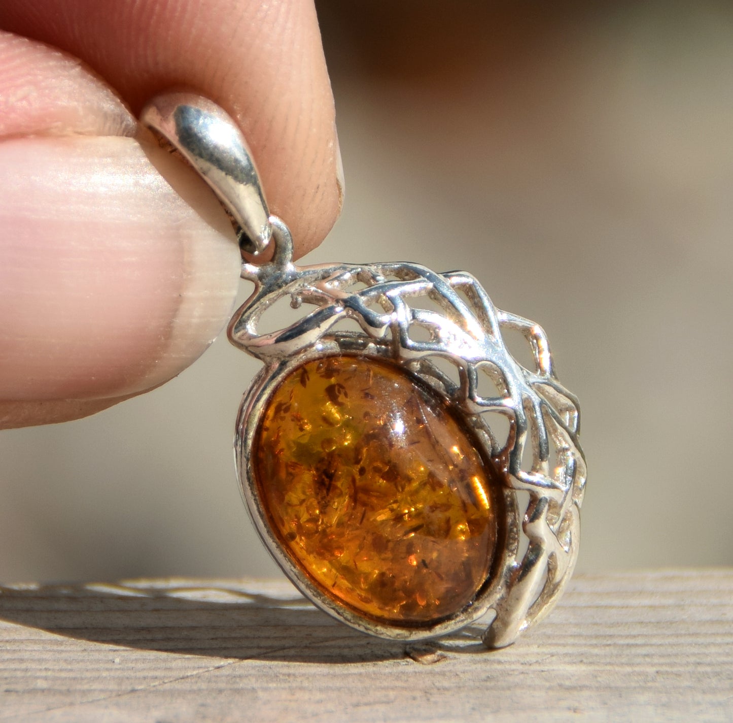 Elegant oval pendant with natural cognac-colored Amber and 925 Silver, MJ Baltica, BW164