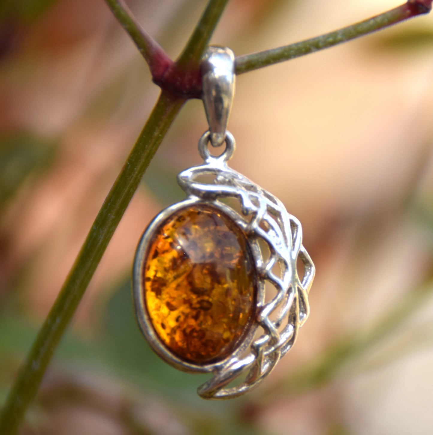 Elegant oval pendant with natural cognac-colored Amber and 925 Silver, MJ Baltica, BW164
