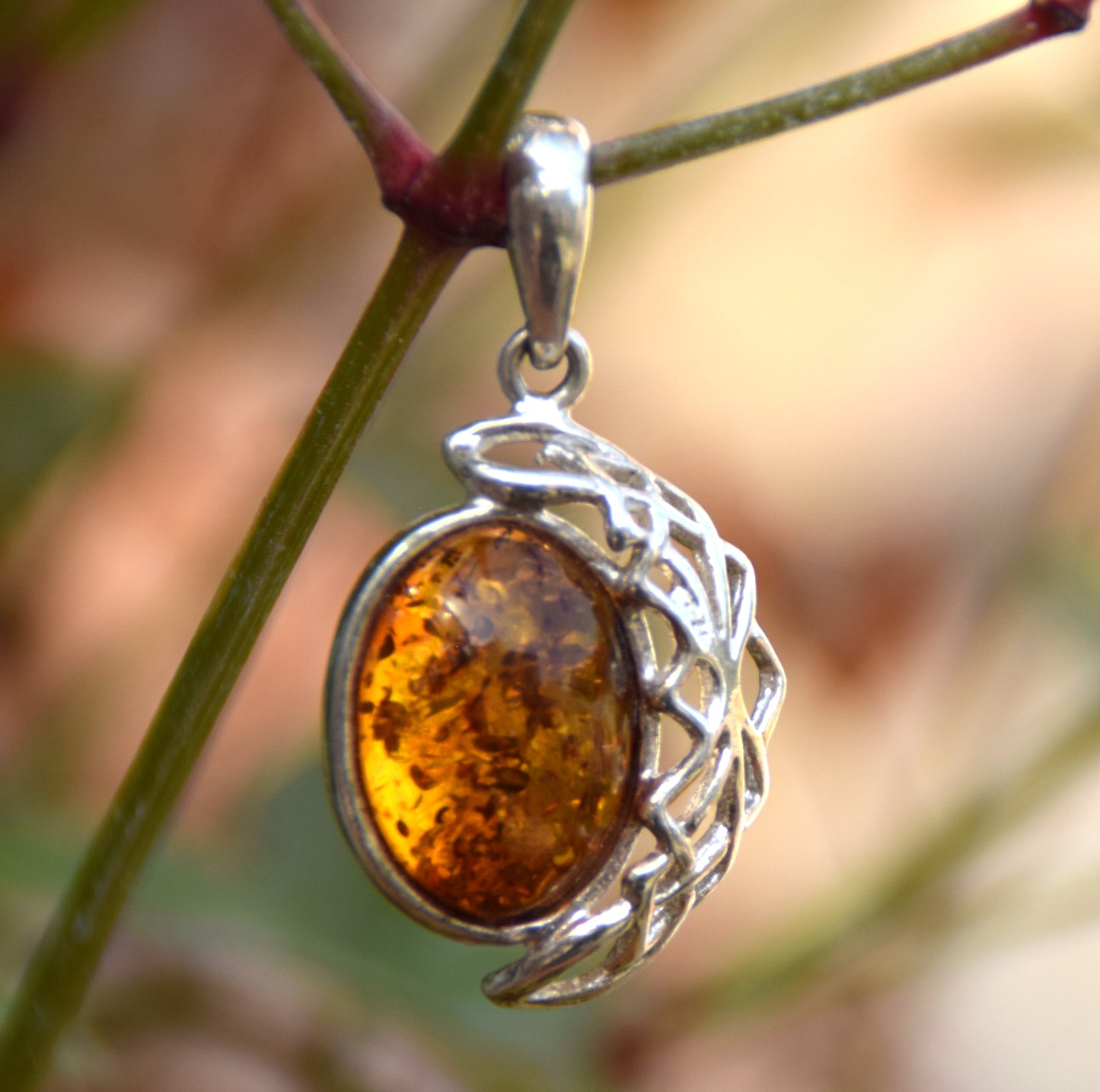 Elegant oval pendant with natural cognac-colored Amber and 925 Silver, MJ Baltica, BW164