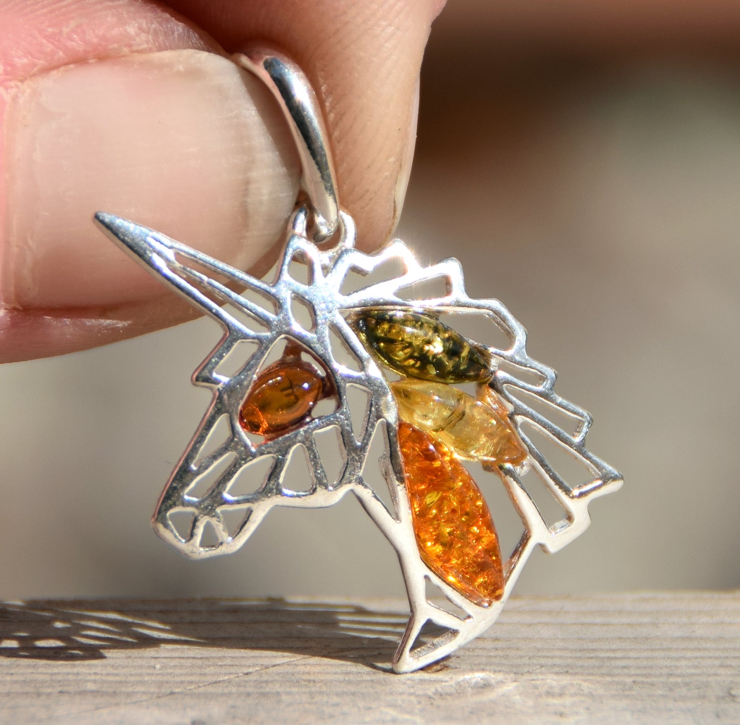 Unicorn pendant in natural amber of various shades and 925 Sterling Silver, MJ Baltica, BW175