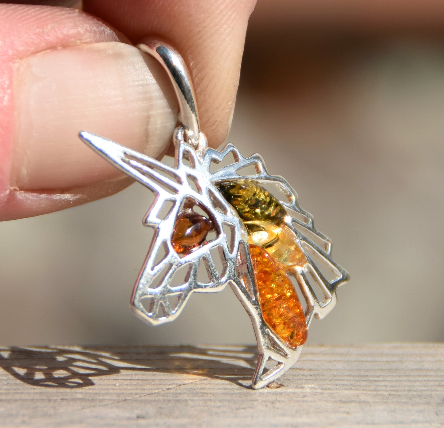 Unicorn pendant in natural amber of various shades and 925 Sterling Silver, MJ Baltica, BW175