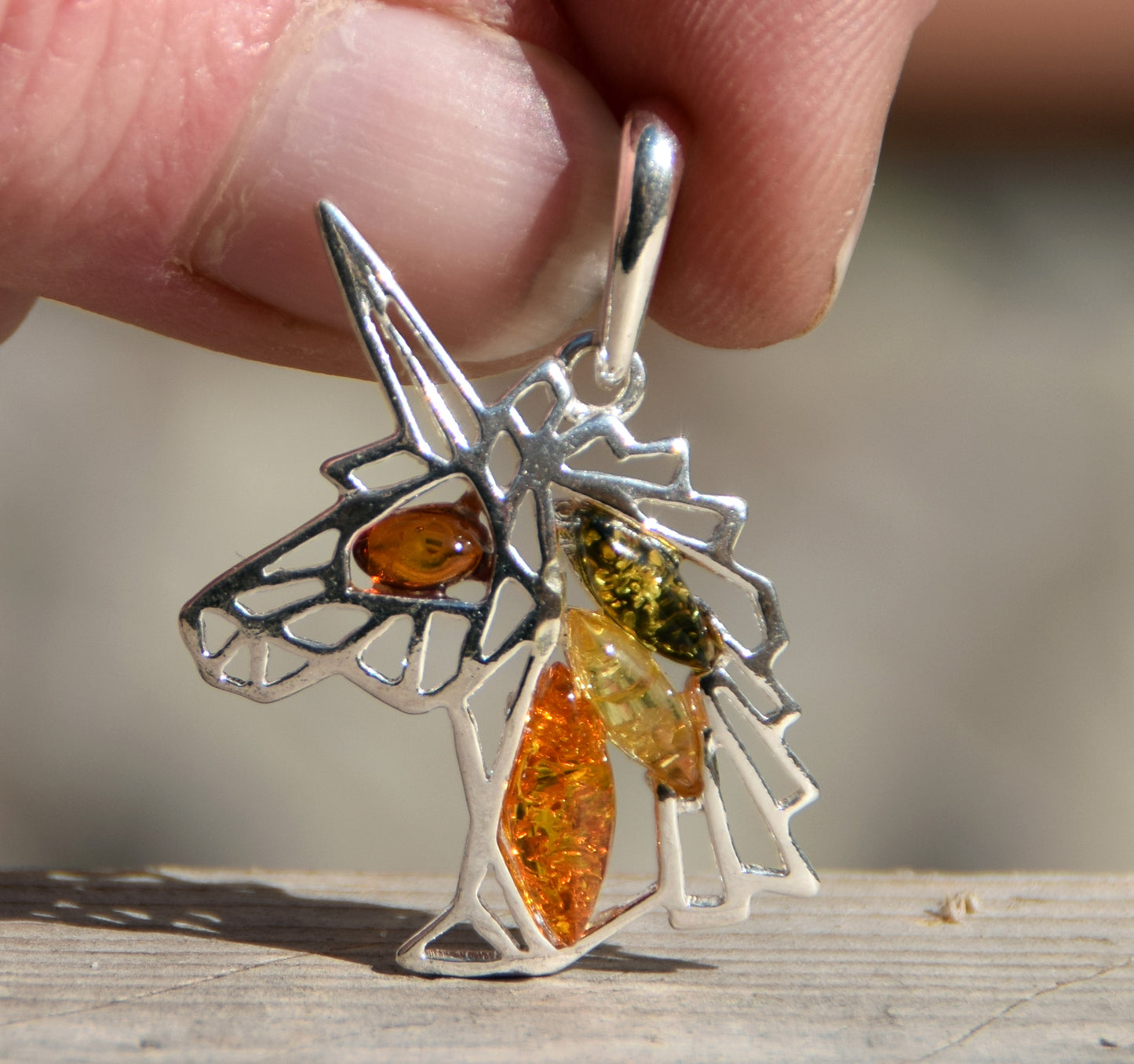 Unicorn pendant in natural amber of various shades and 925 Sterling Silver, MJ Baltica, BW175