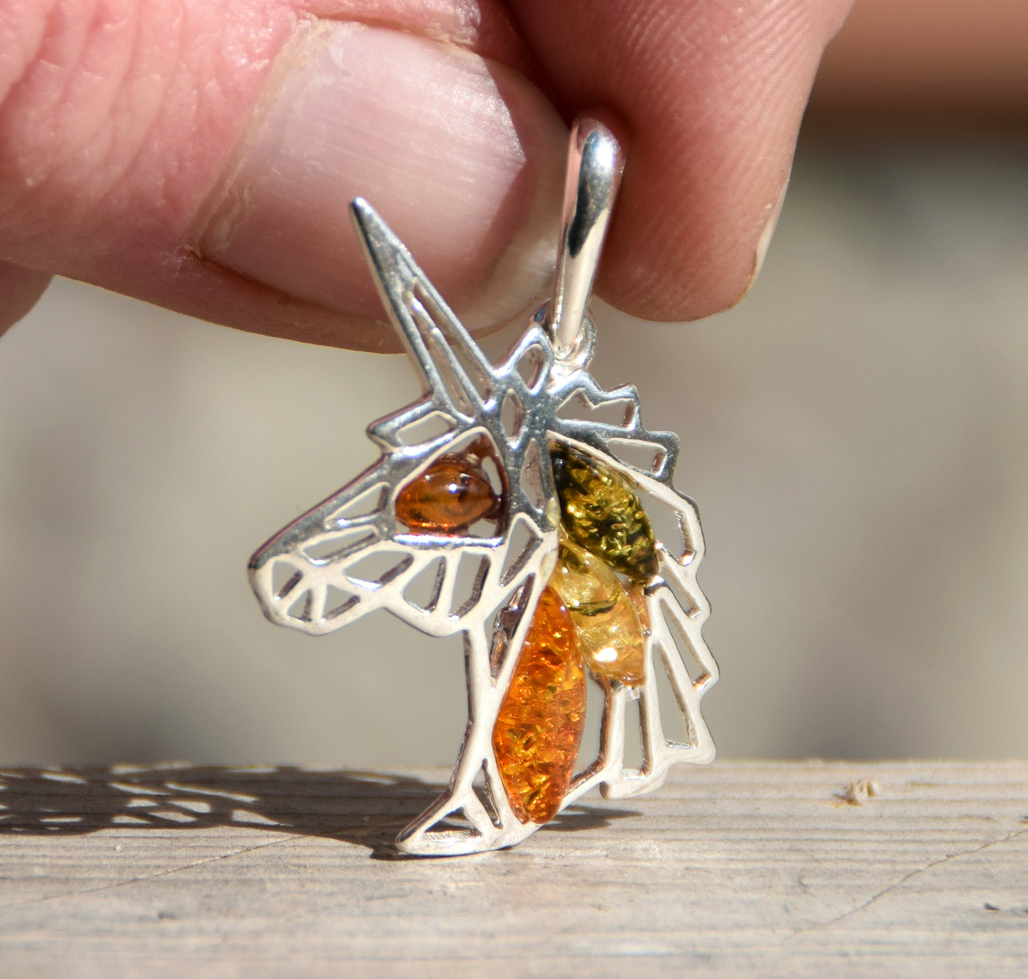 Unicorn pendant in natural amber of various shades and 925 Sterling Silver, MJ Baltica, BW175