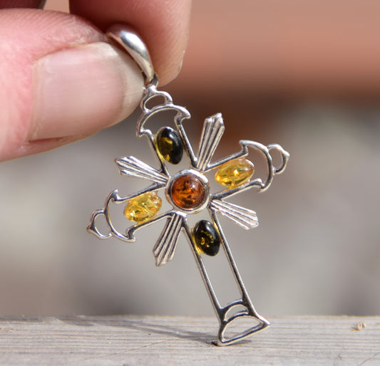 Bright cross-shaped pendant in natural Amber of various shades and 925 Sterling Silver, MJ Baltica, BW181