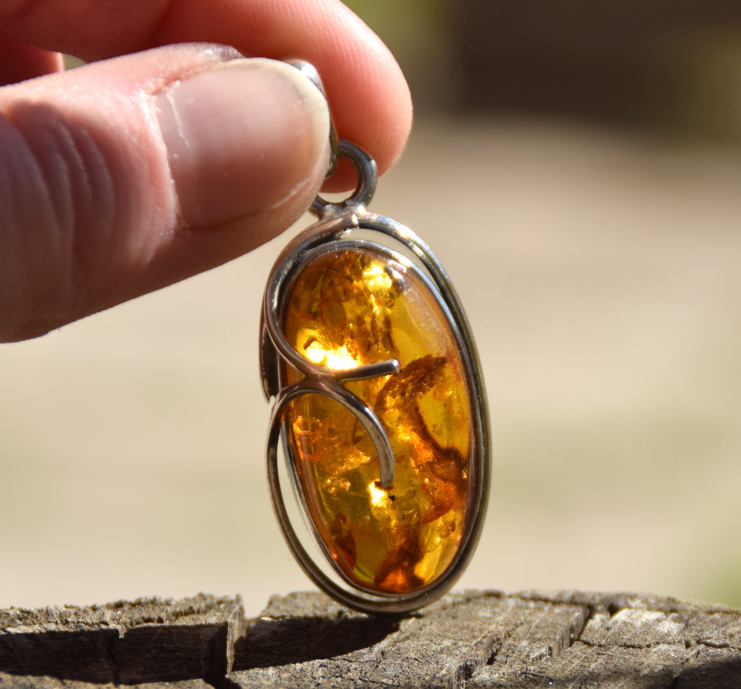 Bright pendant created with natural cognac amber and 925 Silver, MJ Baltica, BW198