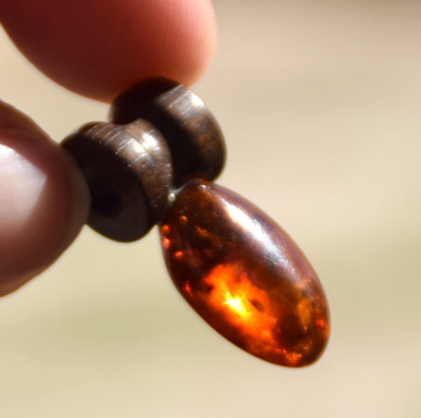 Lightweight oval pendant in natural cognac-colored Amber and mahogany wood, MJ Baltica, BW210